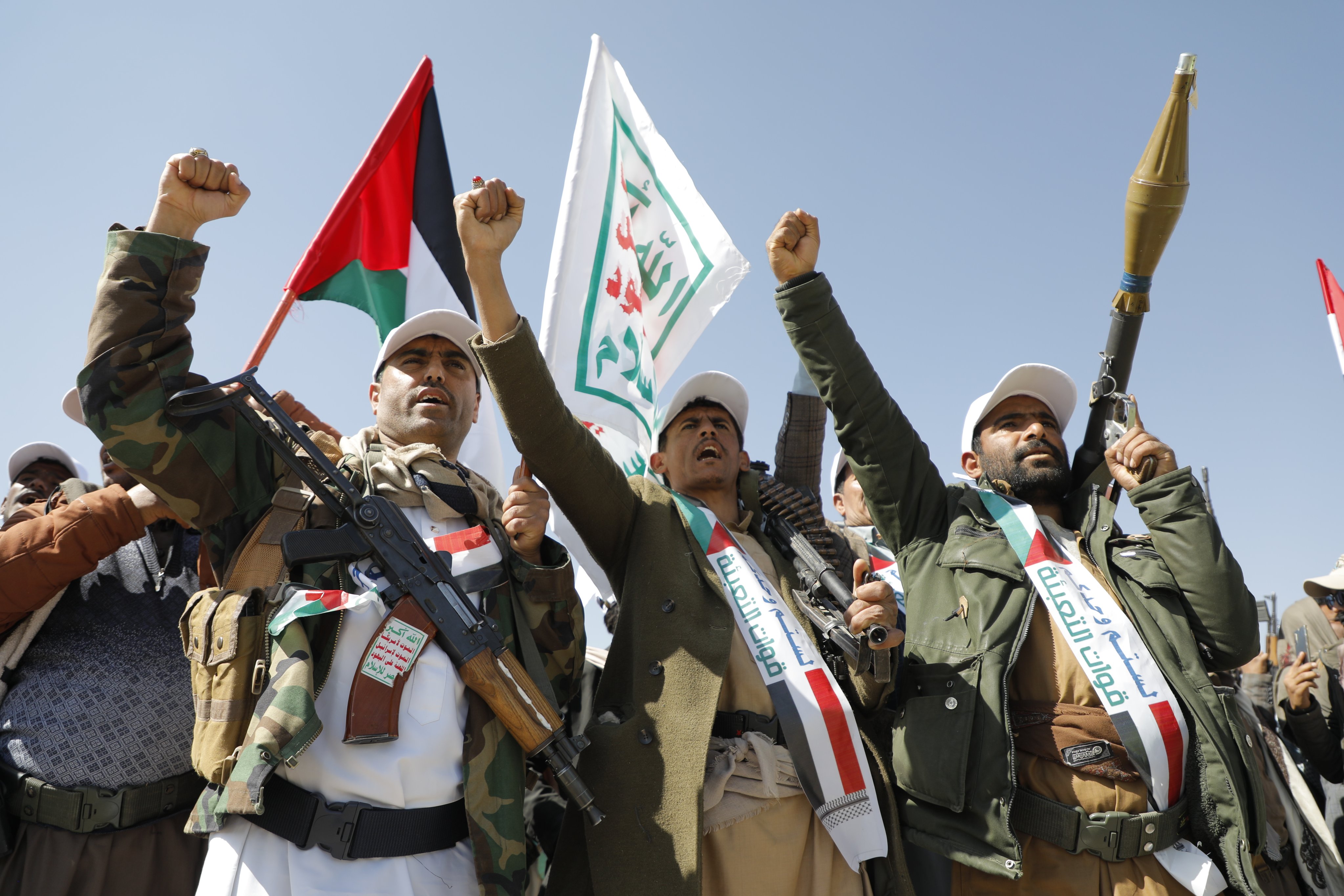 Newly-recruited members of the Houthis’ armed forces march during a parade in Yemen’s Amran province on December 20. Analysts warn that Houthi attacks on Red Sea shipping are a “clear sign of the outcome” of the continuation of Israel’s war in Gaza. Photo: EPA-EFE
