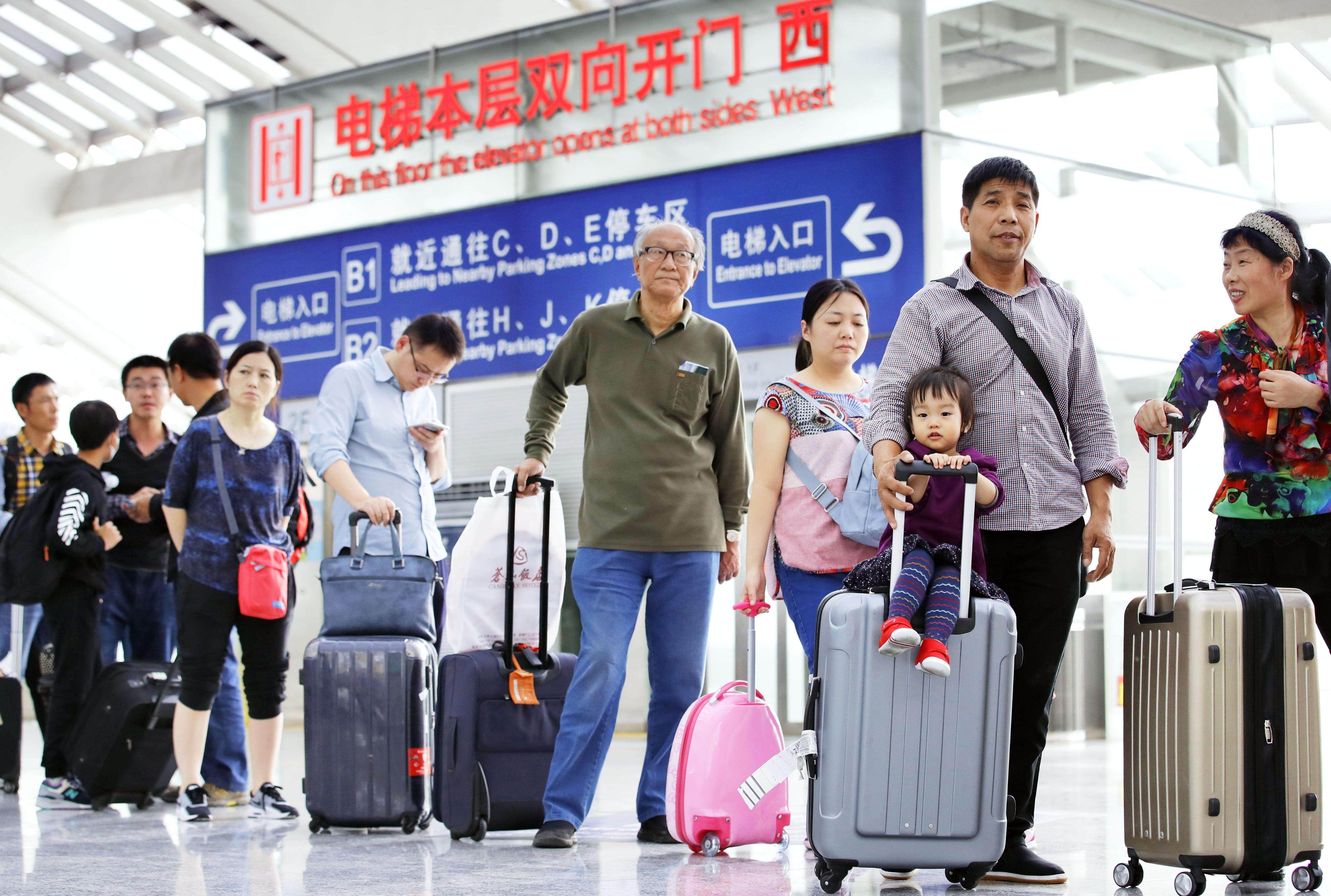 China’s immigration authorities expect a cross border travel surge over the three-day New Year holiday period that would boost travel figures to five times what they were for the same period last year. Photo: Kyodo