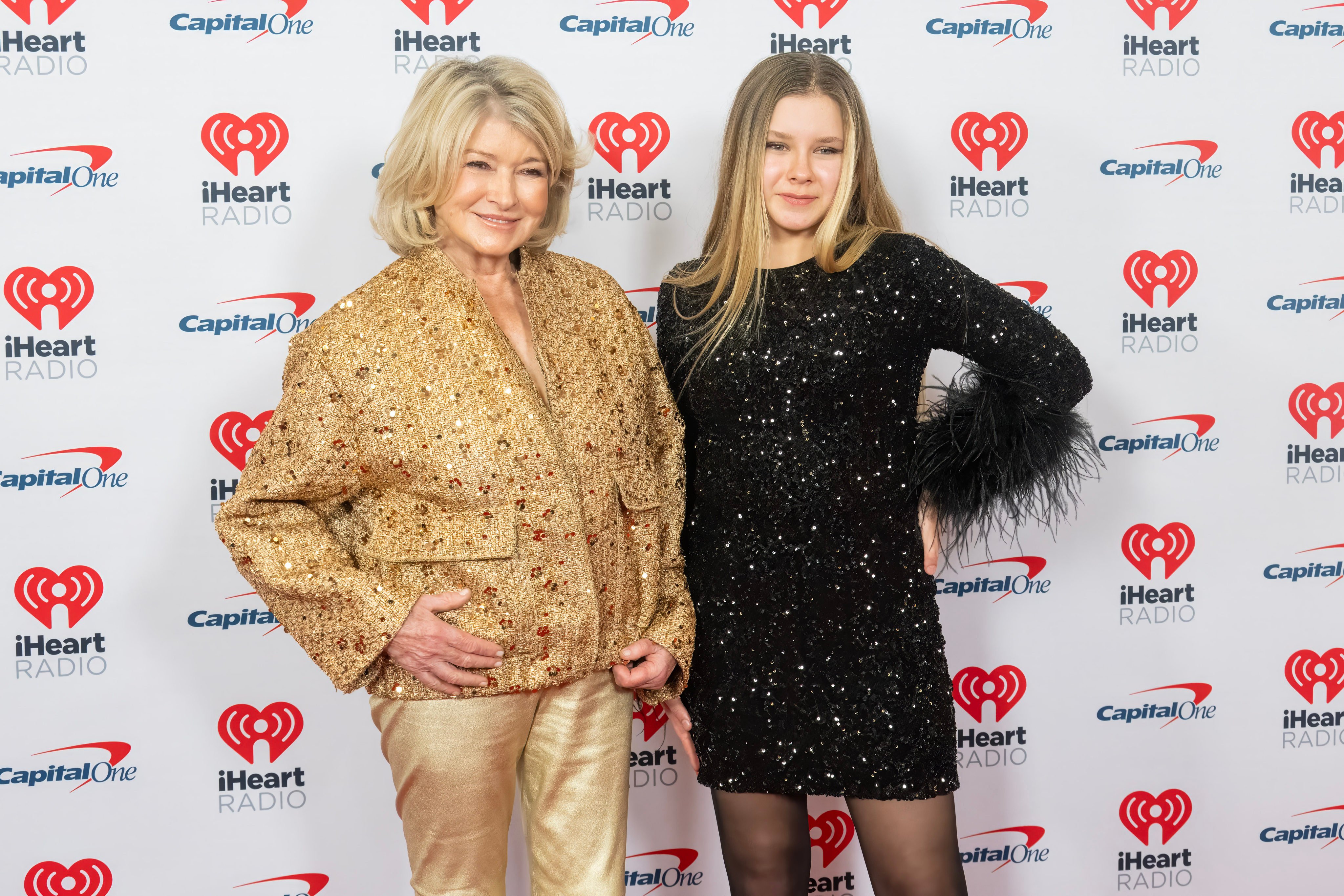 Martha Stewart and Jude Stewart sparkle side by side at iHeartRadio Jingle Ball. Photo: WireImage