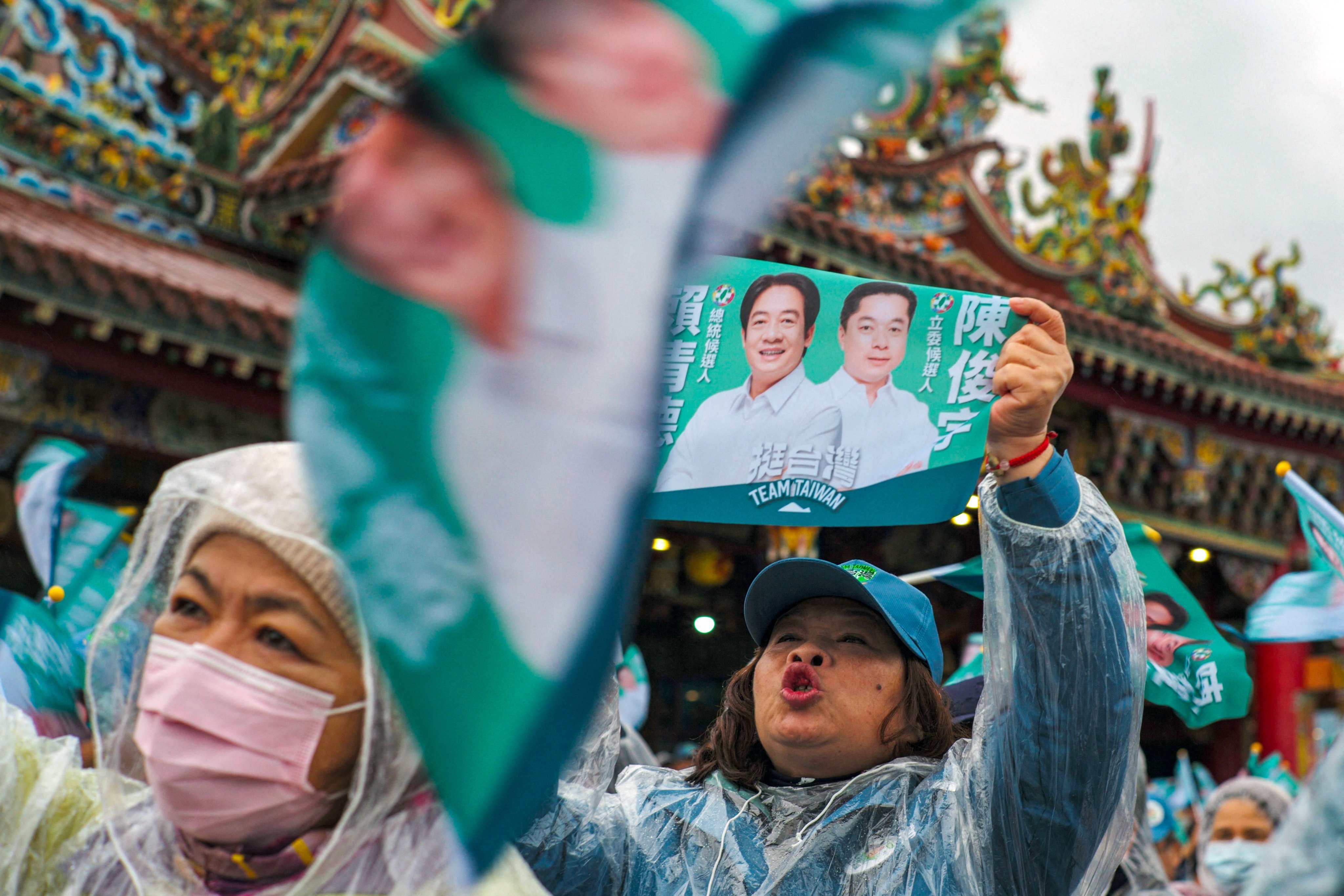 Supporters of Taiwan’s Democratic Progressive Party (DPP) at a rally in Yilan county on December 21. The DPP government has been accused of moving towards secession through salami-slicing tactics. Photo: AFP