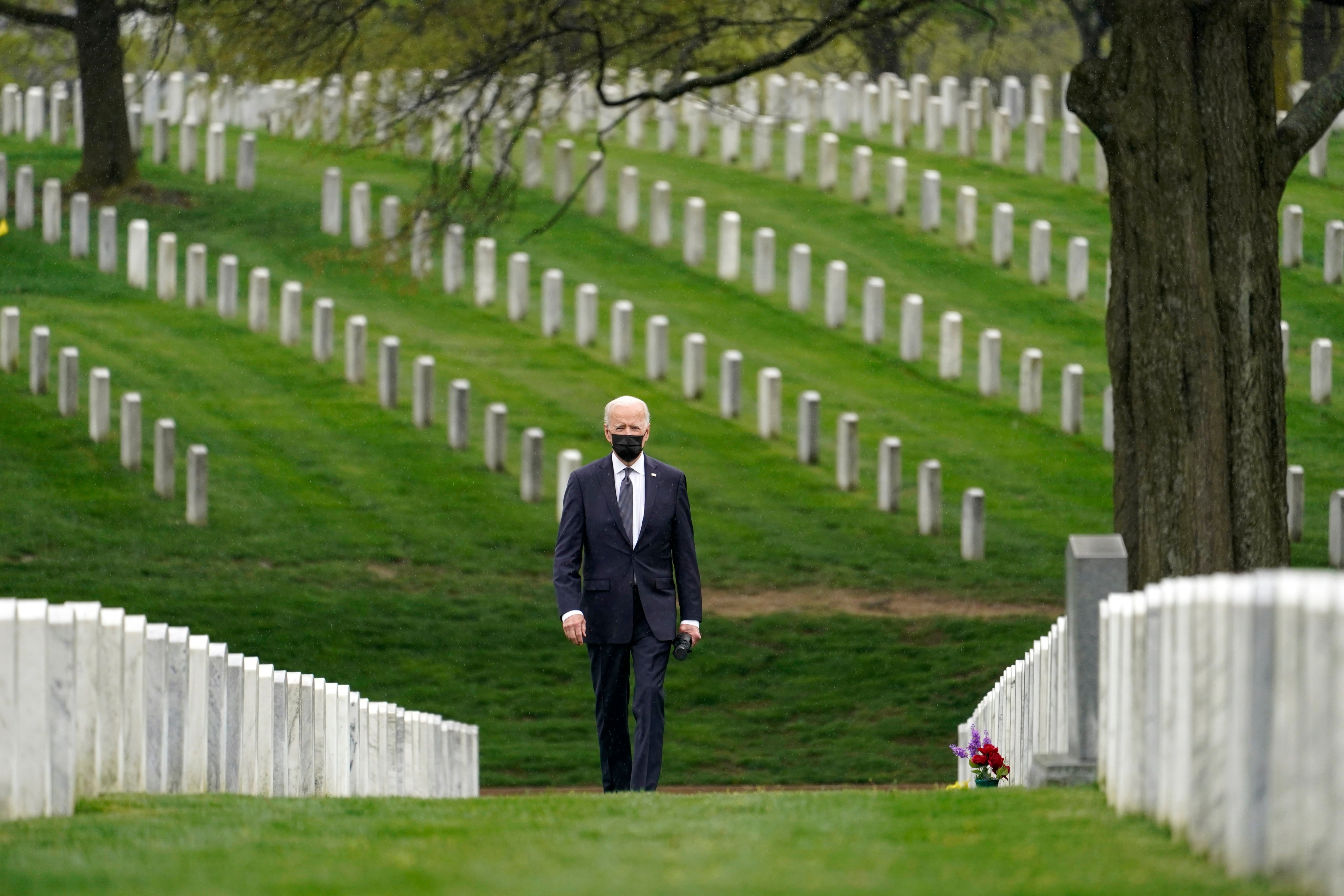 President Joe Biden visits the Arlington National Cemetery on April 14, 2021, ahead of the troop withdrawal from Afghanistan. In the past three years, he has abandoned Afghanistan, taken on Russia and now faces an impossible task in bringing Israel to heel on war. Photo: AP