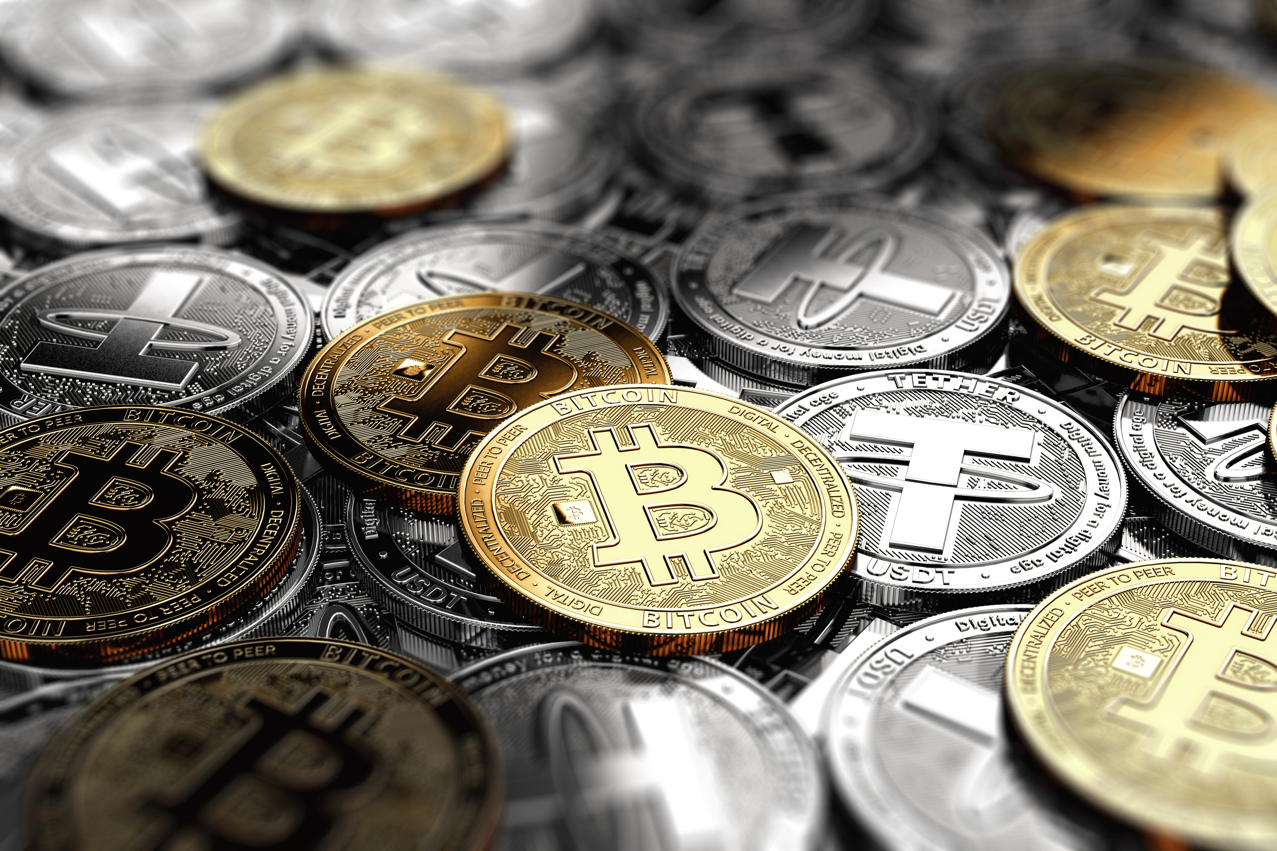 Representations of bitcoin and tether tokens in a 3D rendering. Hong Kong’s proposed stablecoin regulation opens the question of whether the world’s largest issuer of such tokens, Tether, will seek a licence in the city where it was founded. Photo: Shutterstock