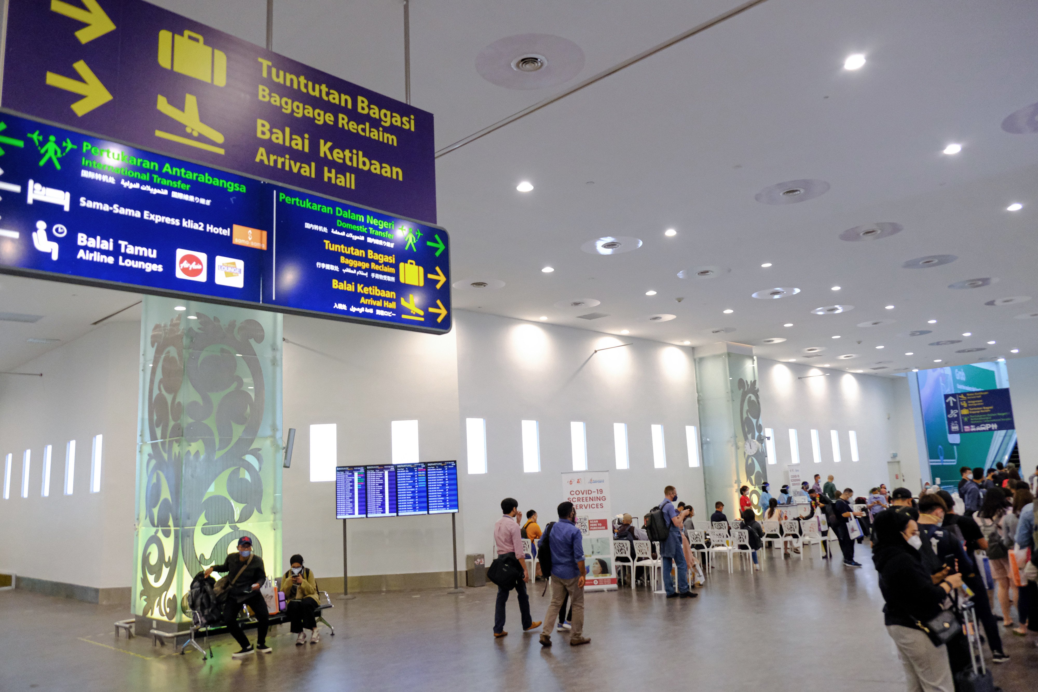 Travellers at Kuala Lumpur International Airport in Sepang, Malaysia. Photo: Bloomberg