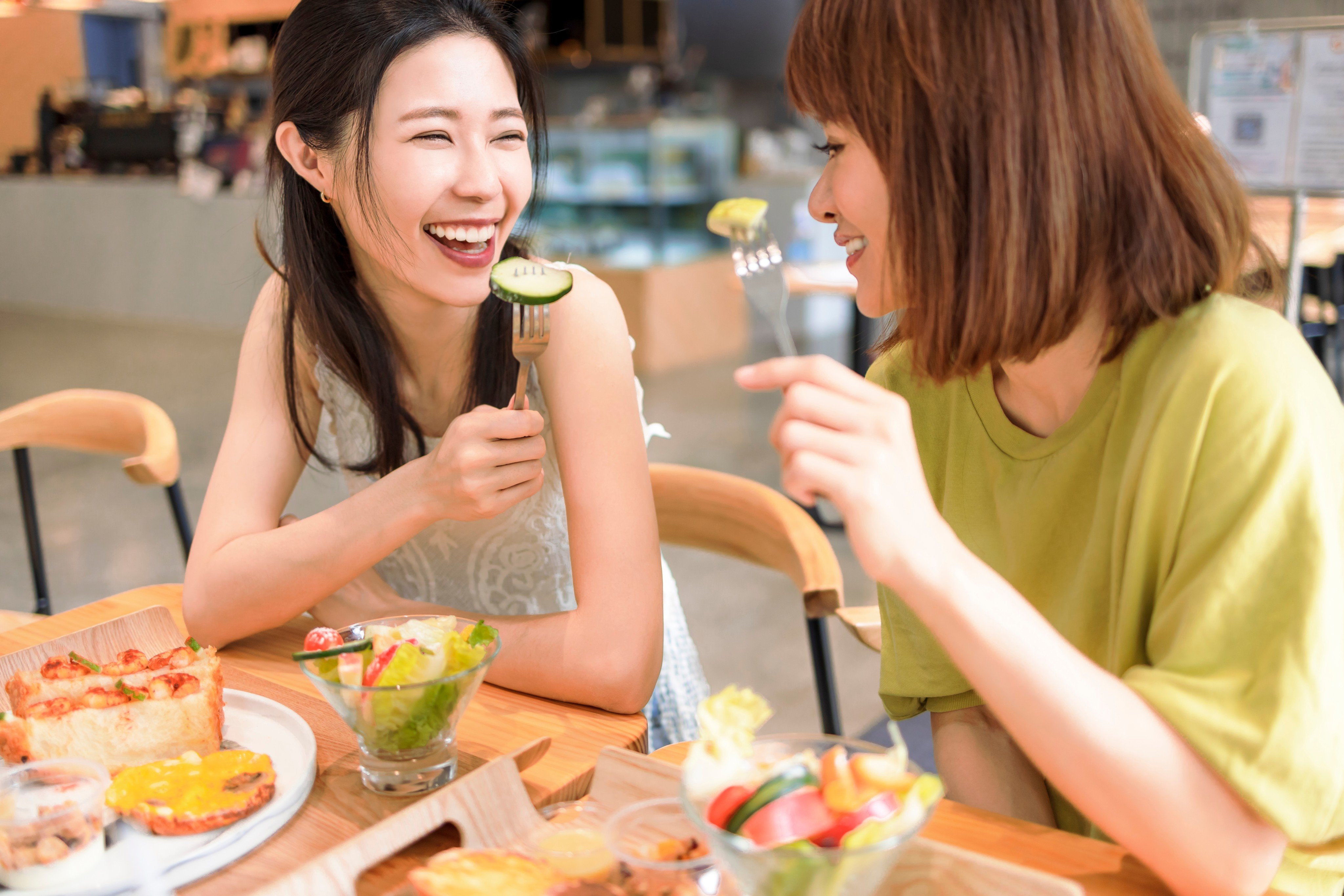 These women are enjoying a vegan meal, 
 but the Veganuary challenge – dropping all animal products from your diet for January – can be daunting. Experts give us their tips for success and explain the health benefits of a plant-based diet. Photo: Shutterstock