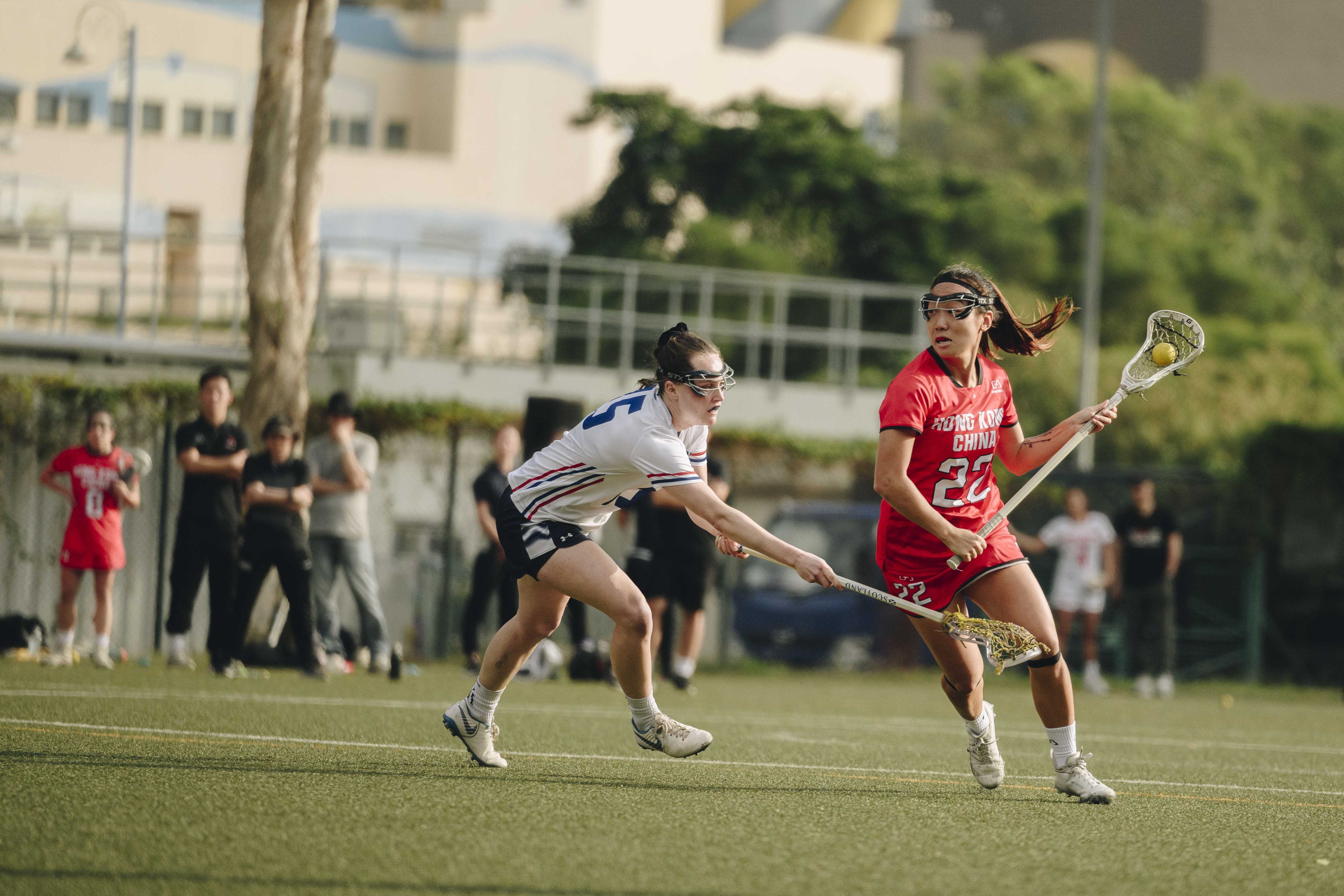 Sally Tang (right) scored a goal and registered an assist in Hong Kong’s defeat to Great Britain. Photo: HK Lacrosse