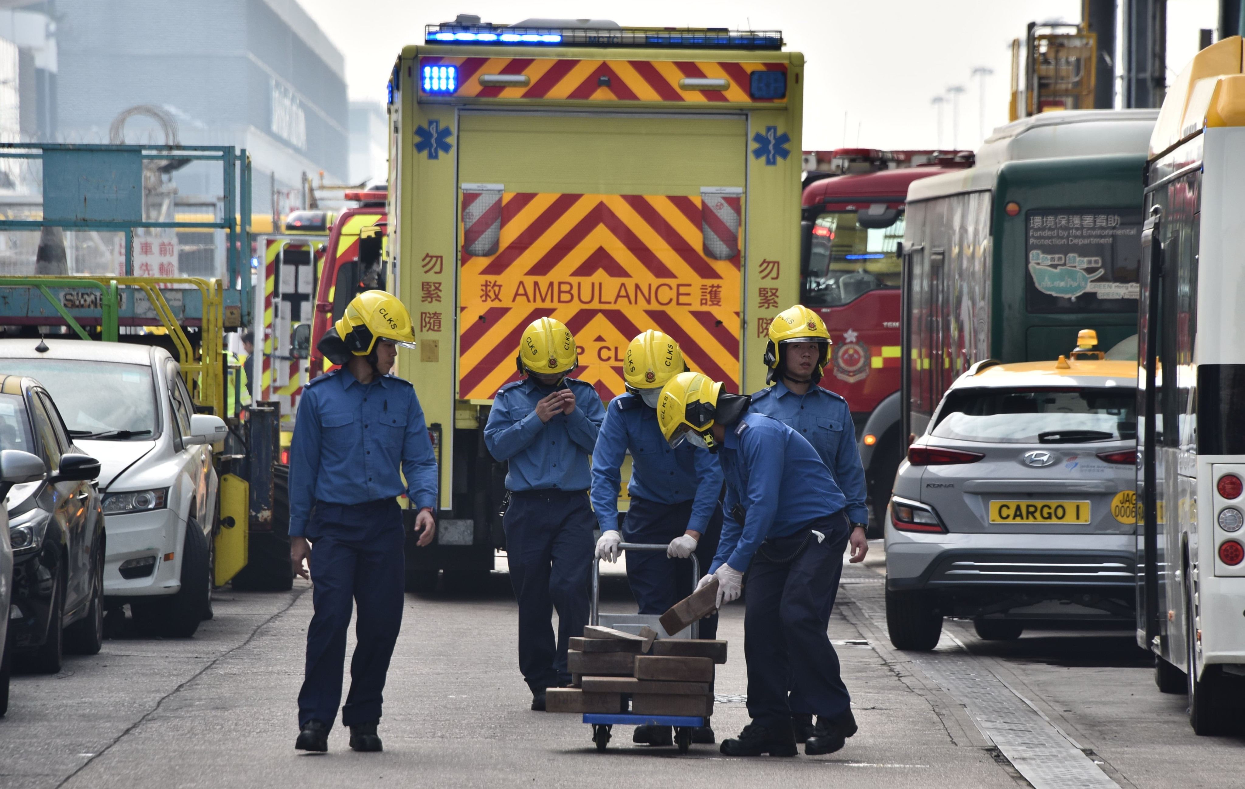 An ambulance arrives at the scene of an accident where a worker died after being trapped by an elevating platform near Hong Kong International Airport on Thursday. Photo: Handout