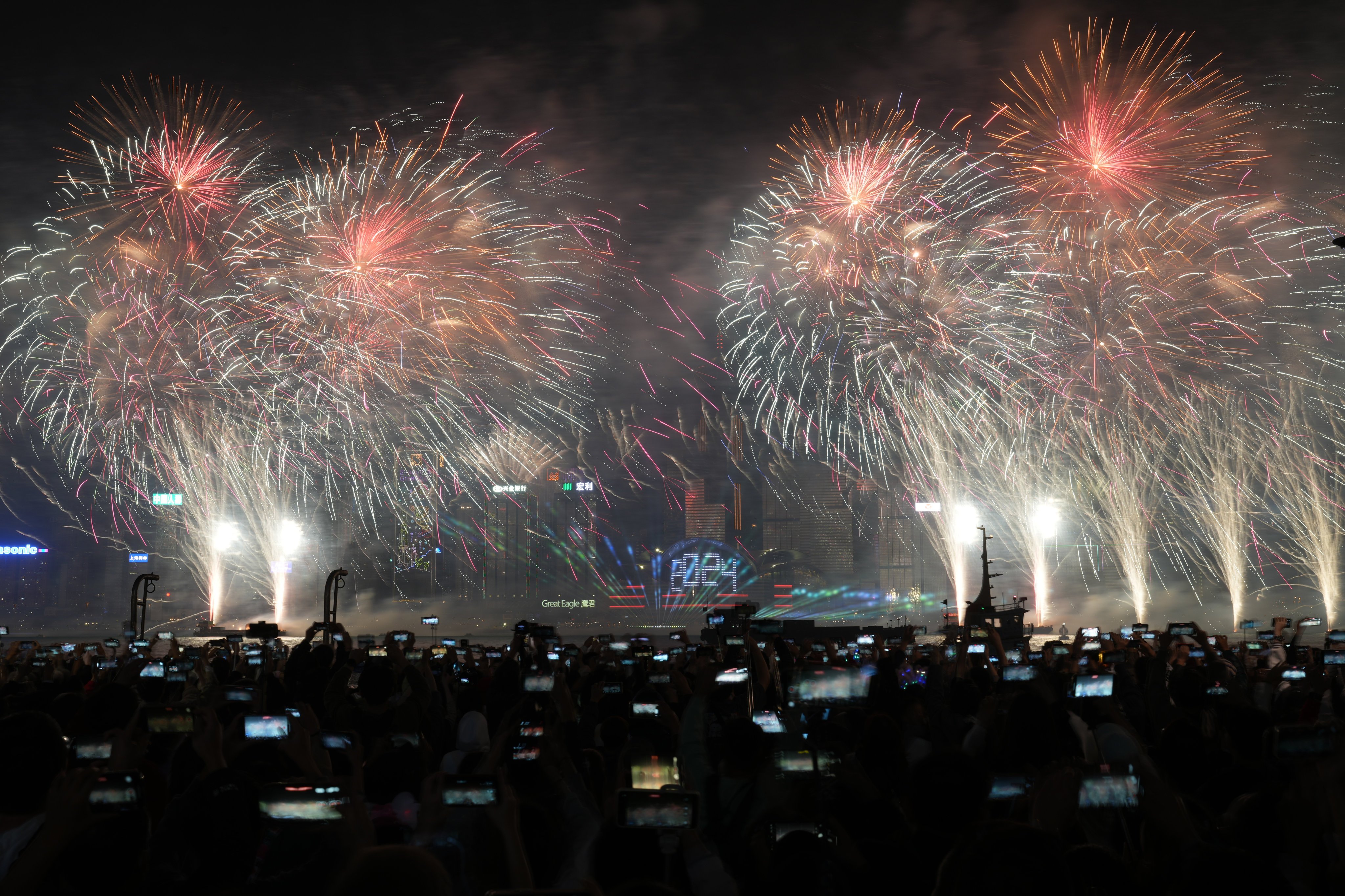 Fireworks light up the night sky above Victoria Harbour in Hong Kong. Photo: Sam Tsang