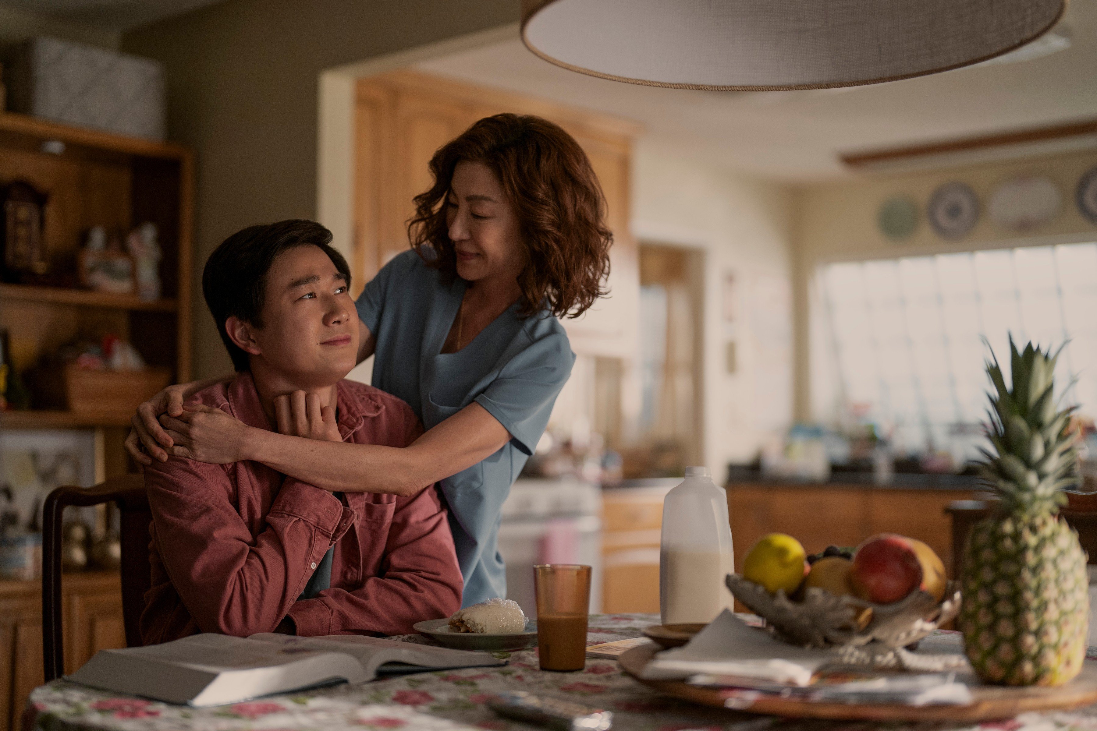 Michelle Yeoh and Sam Song Li in a still from upcoming Netflix action drama “The Brothers Sun”. Li and co-star Justin Chien, both new to Hollywood, say they were put at ease by their Oscar-winning co-star. Photo: Netflix