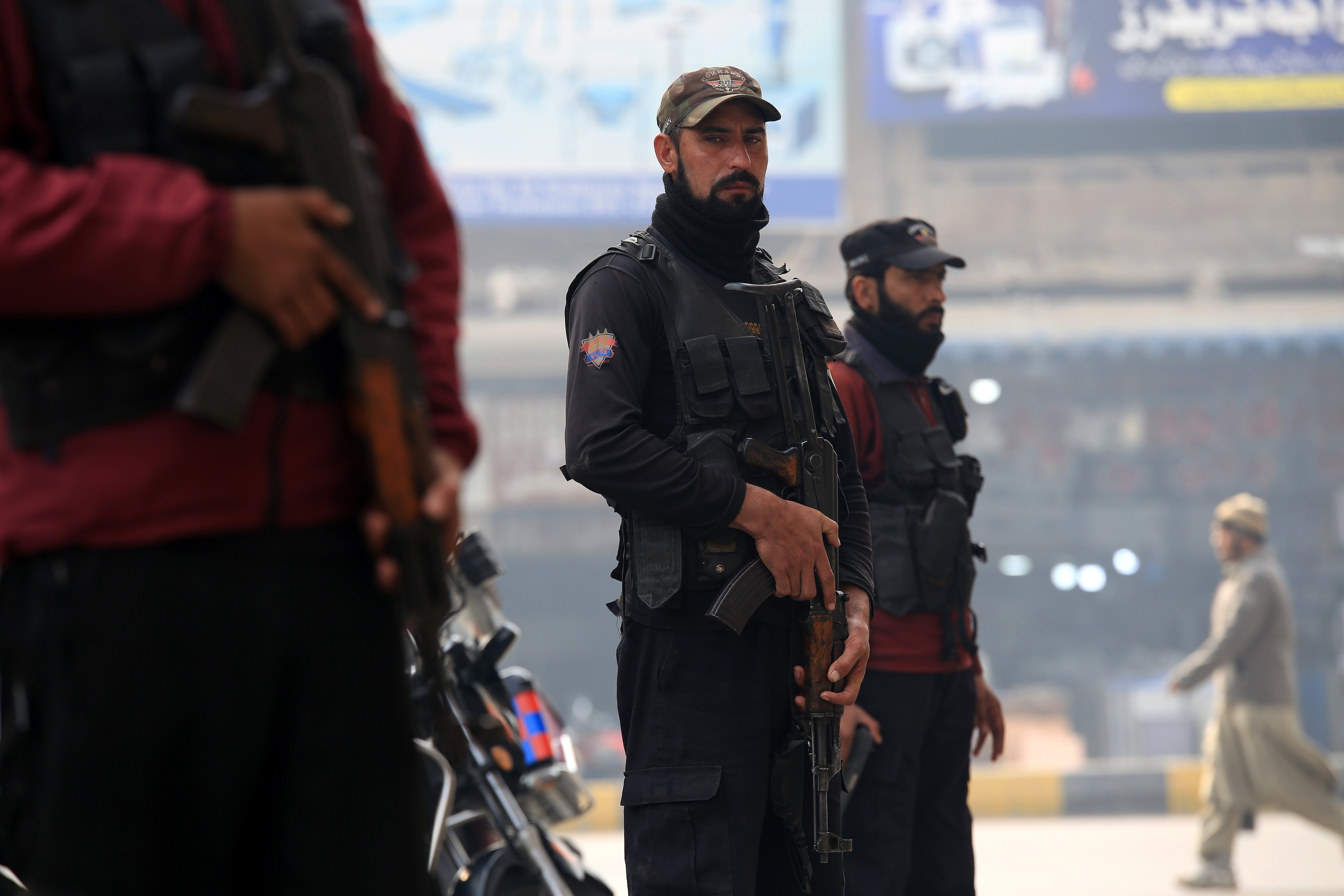 Pakistani security personnel wait at a checkpoint in Peshawar in December following deadly attacks by militants targeting soldiers and police. Photo: EPA-EFE