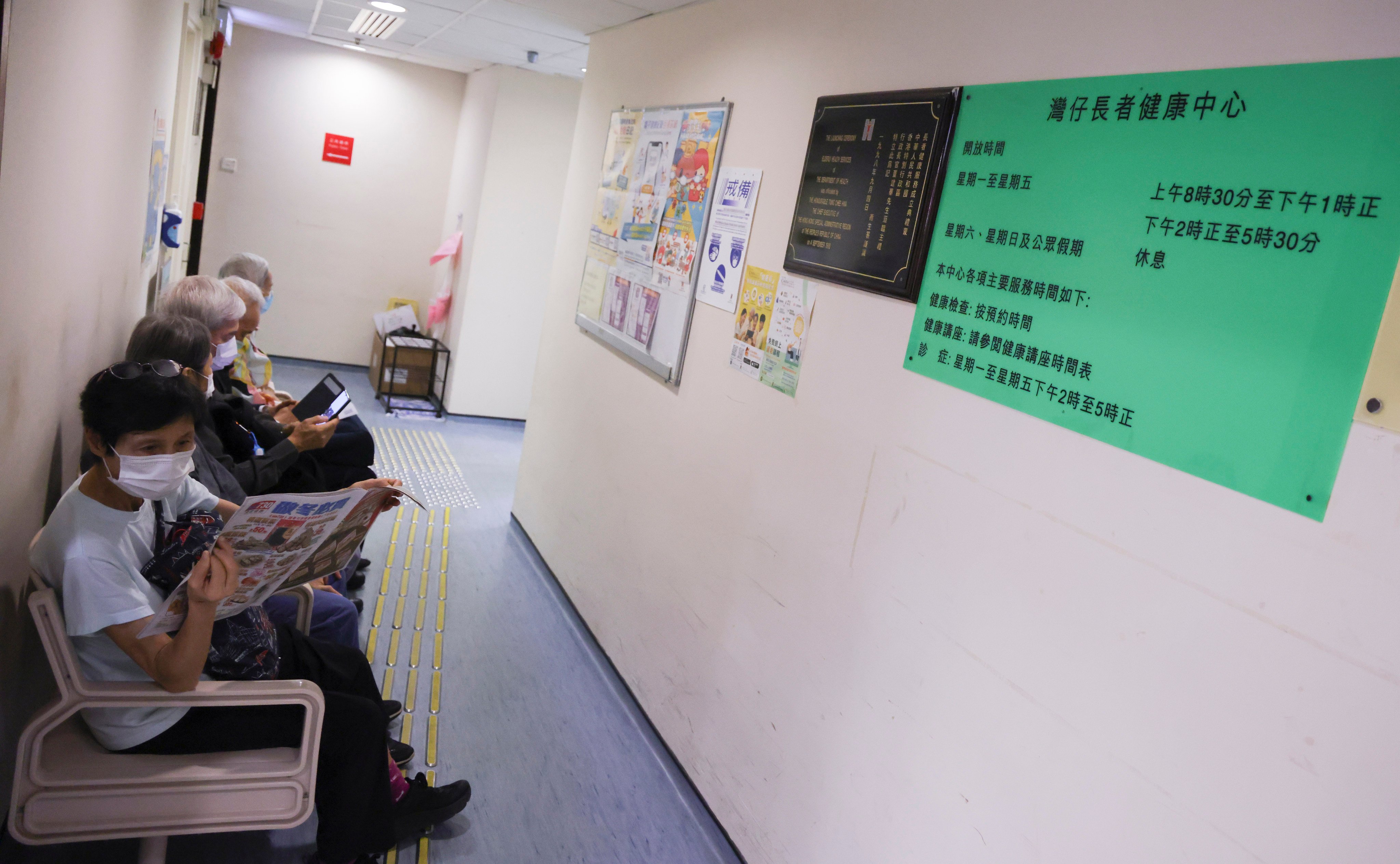 People queue outside the Wan Chai Elderly Health Centre on December 14. End-of-life planning has grown in importance as Hong Kong’s population grows older and the size of younger generations shrinks. Photo: May Tse