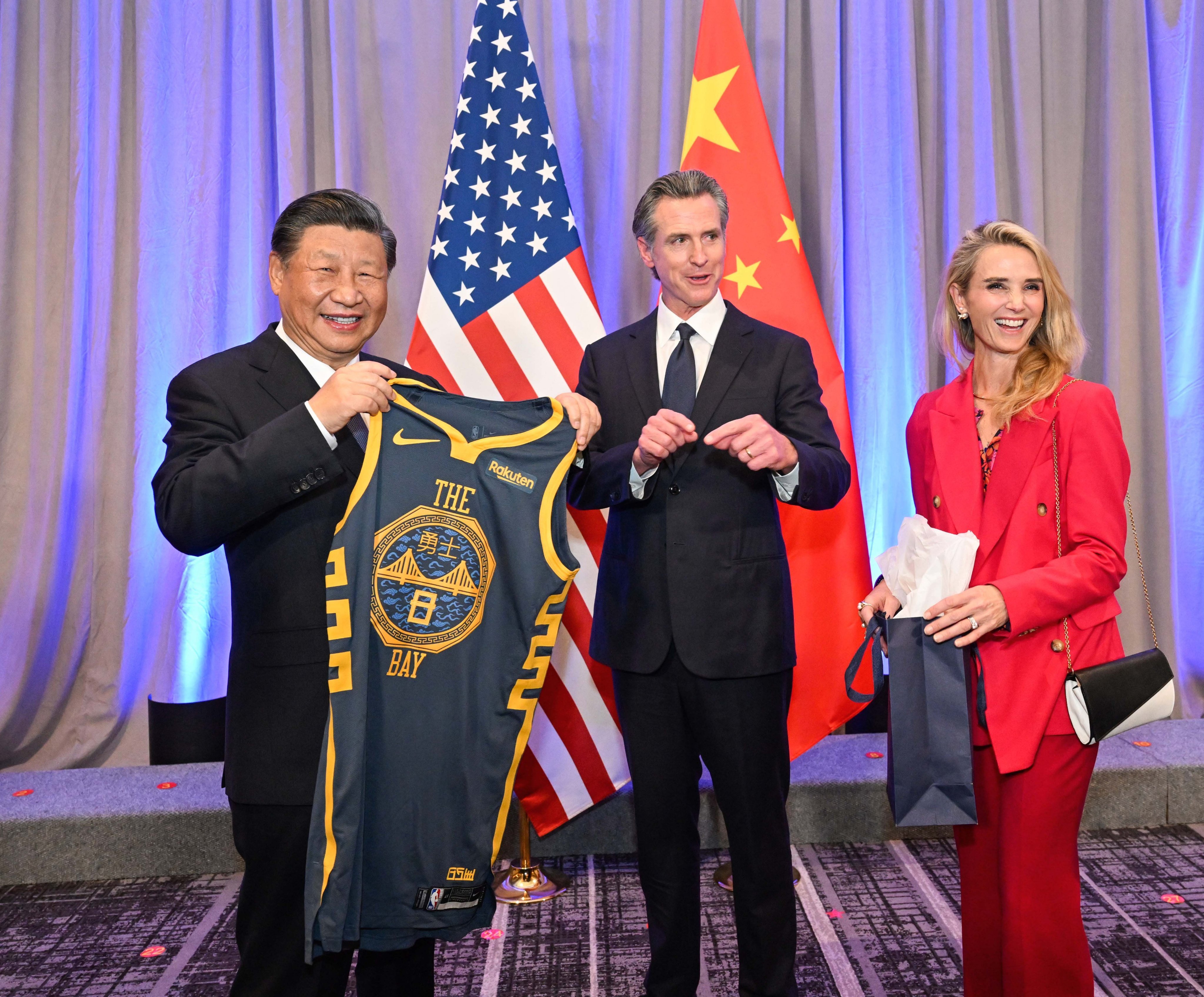 President Xi Jinping with a Golden State Warriors basketball jersey gifted to him by California governor Gavin Newsom, ahead of a welcome dinner in San Francisco in November. Photo: X/SpokespersonCHN