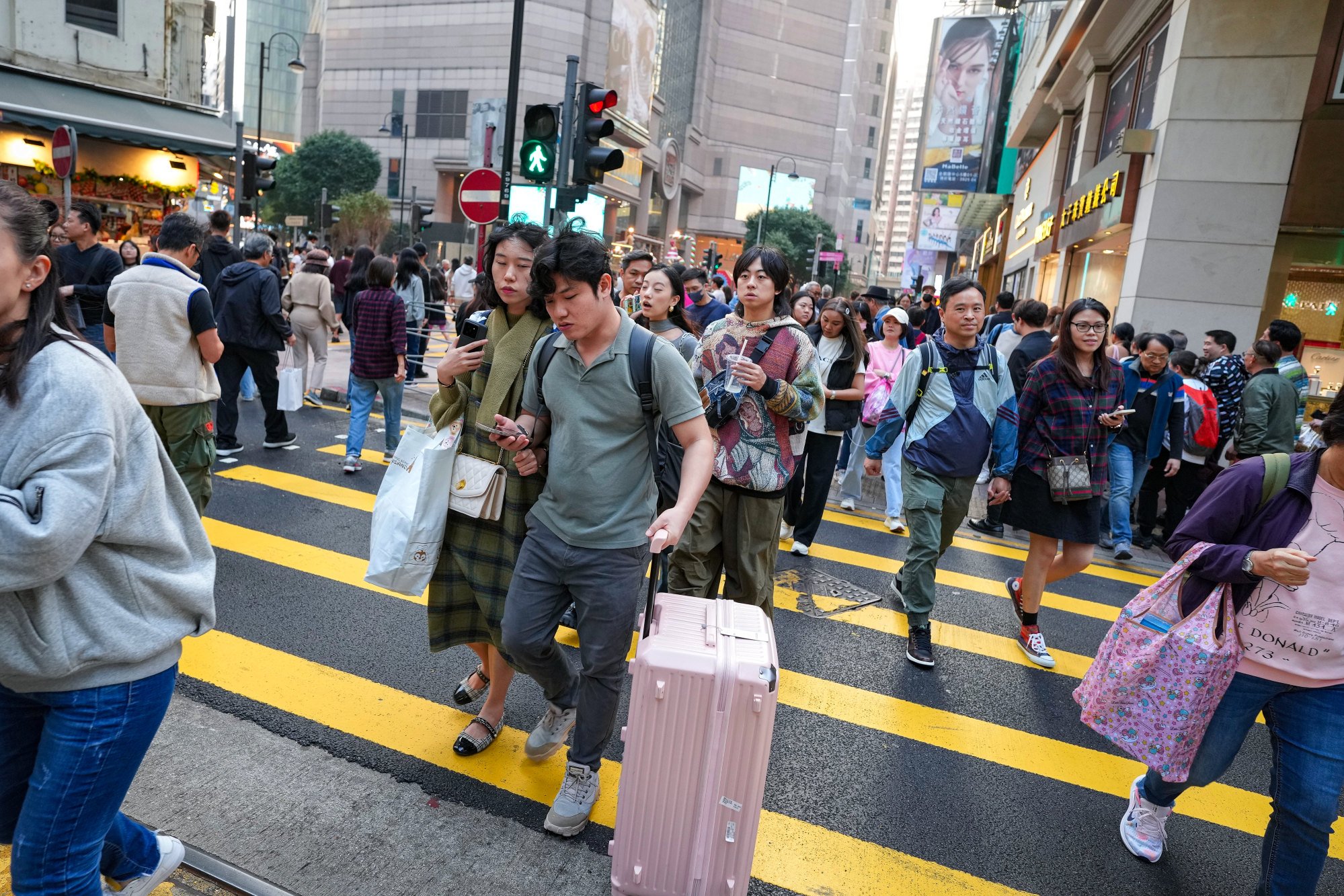 Shoppers in Causeway Bay on New Year’s Day. Authorities have been accused of being too passive in their efforts to lure tourists. Photo: Elson Li
