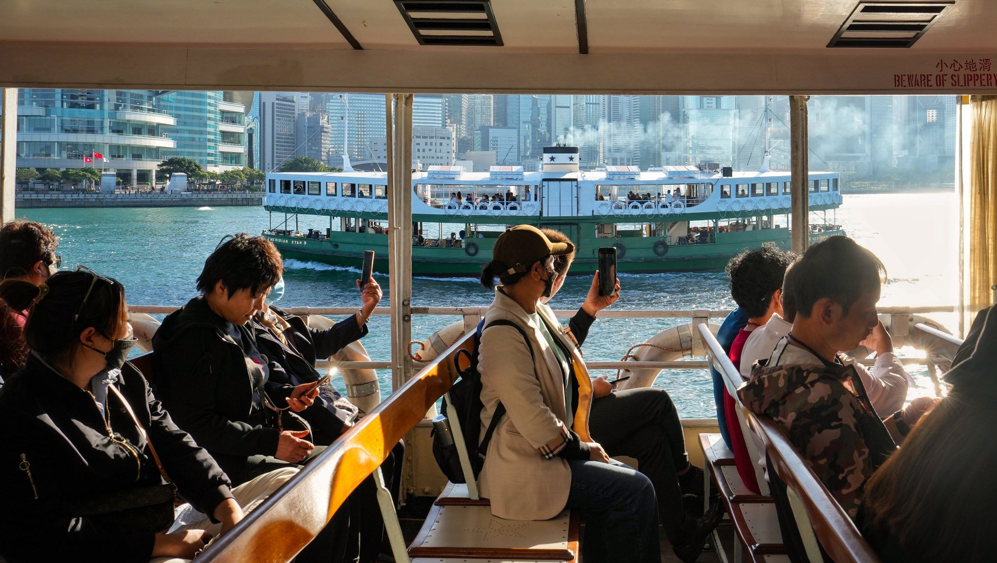 Passengers on the Star Ferry in Hong Kong. The number of visitors in the third quarter of 2023 reached about 10.44 million, about 68 per cent of the figure for the same period in both 2017 and 2018. Photo: Elson Li