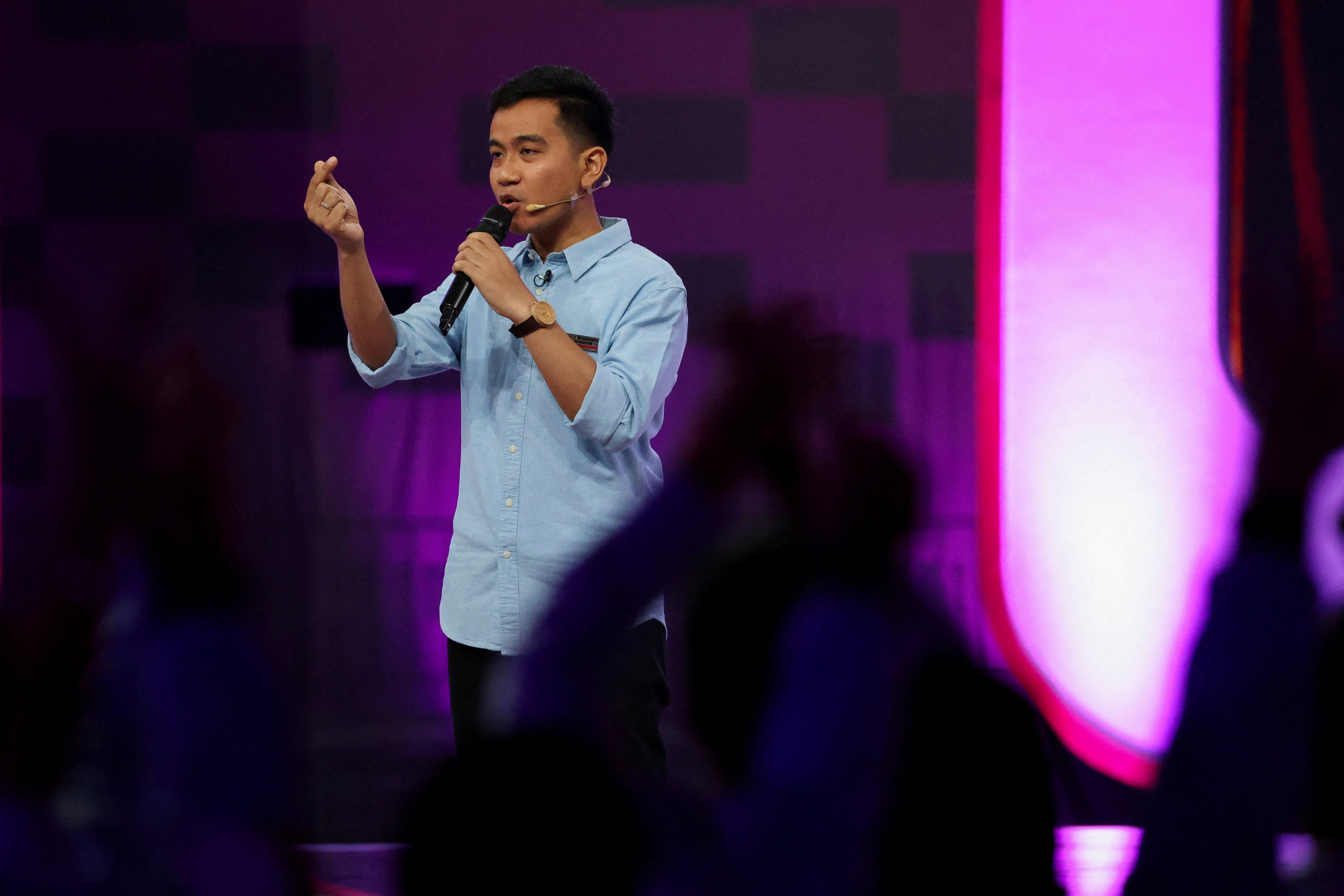 Gibran Rakabuming Raka, a vice-presidential candidate and the eldest son of Indonesian President Joko Widodo, gestures during a televised debate in Jakarta on December 22. Photo: Reuters