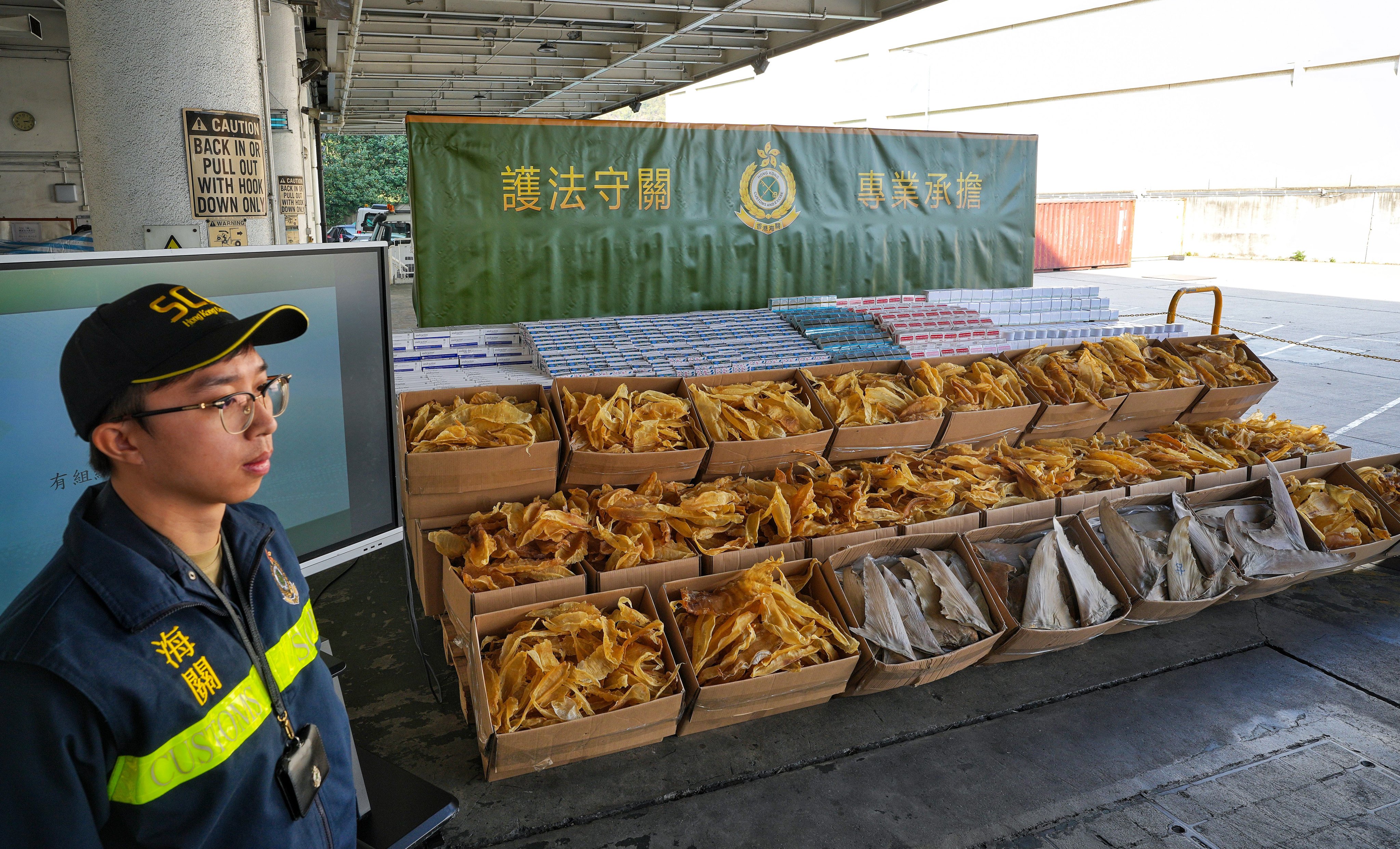 Customs displays the goods seized during the operation. The smuggled items were destined for Vietnam, according to the department. Photo: Elson Li