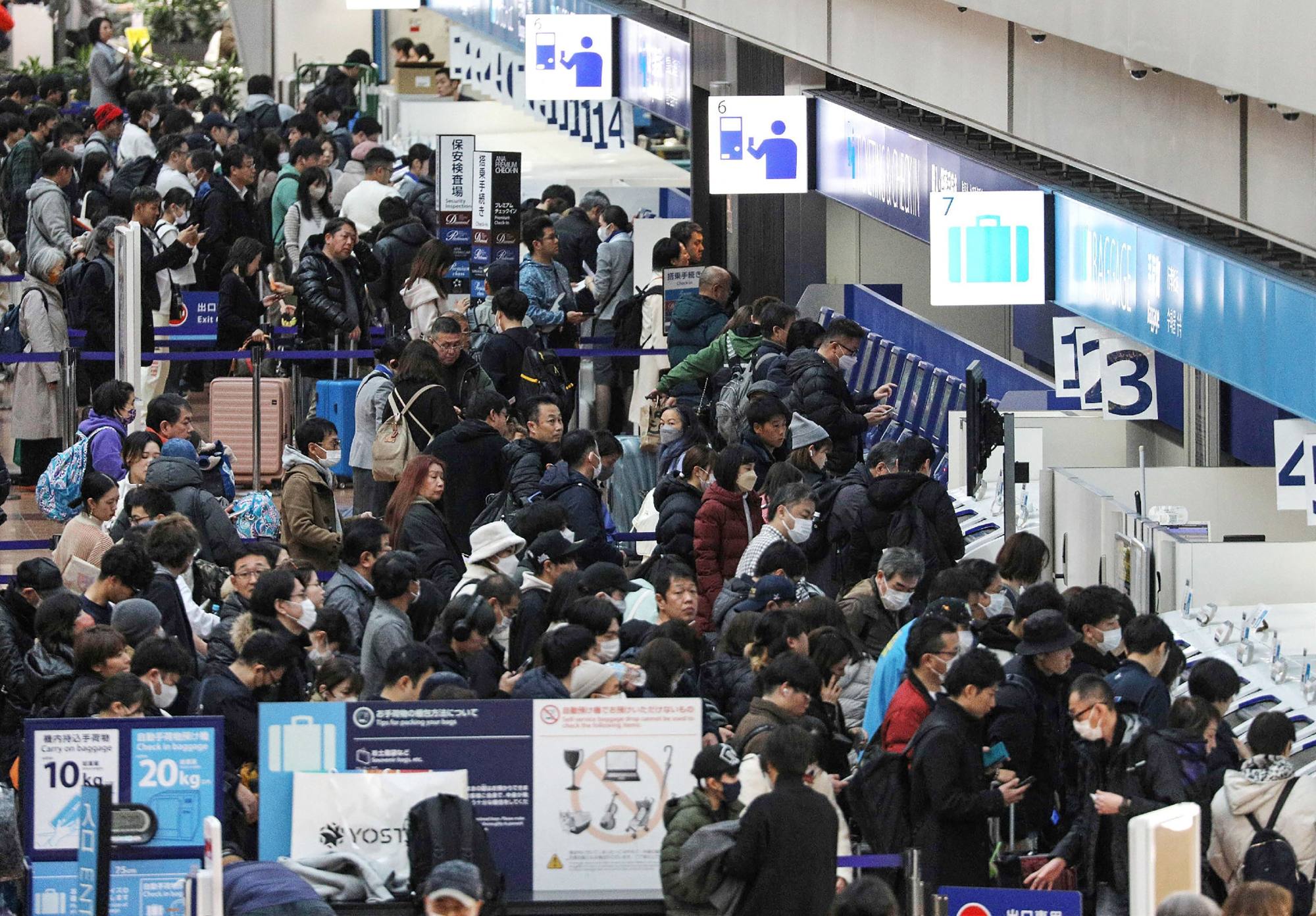 Several Haneda-Hong Kong flights have been delayed, cancelled or diverted in the wake of the deadly collision. Photo: Jiji Press / AFP