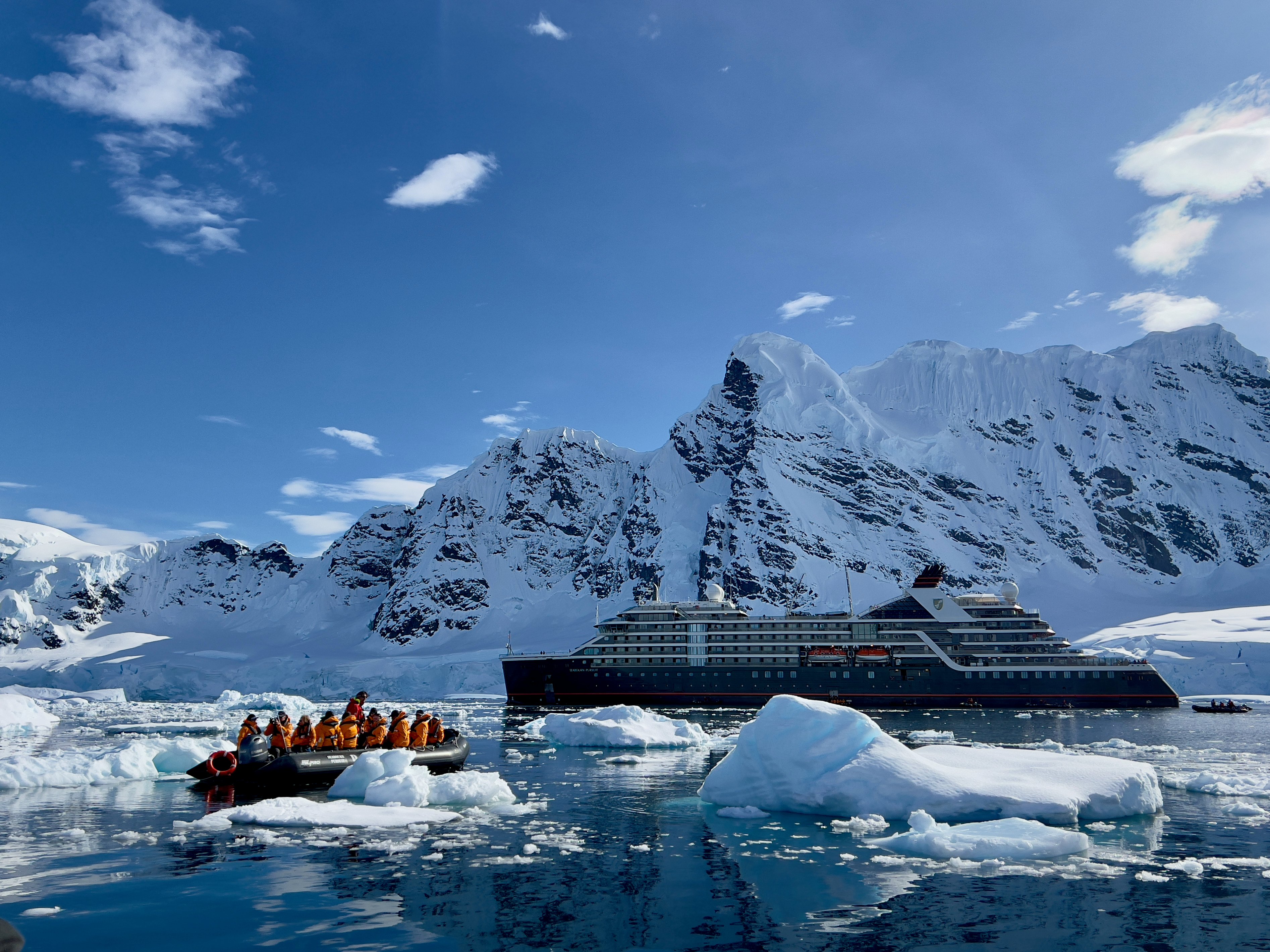 A Zodiac inflatable makes its way back to the Seabourn Pursuit in Antarctica. Photo: Peter Neville-Hadley