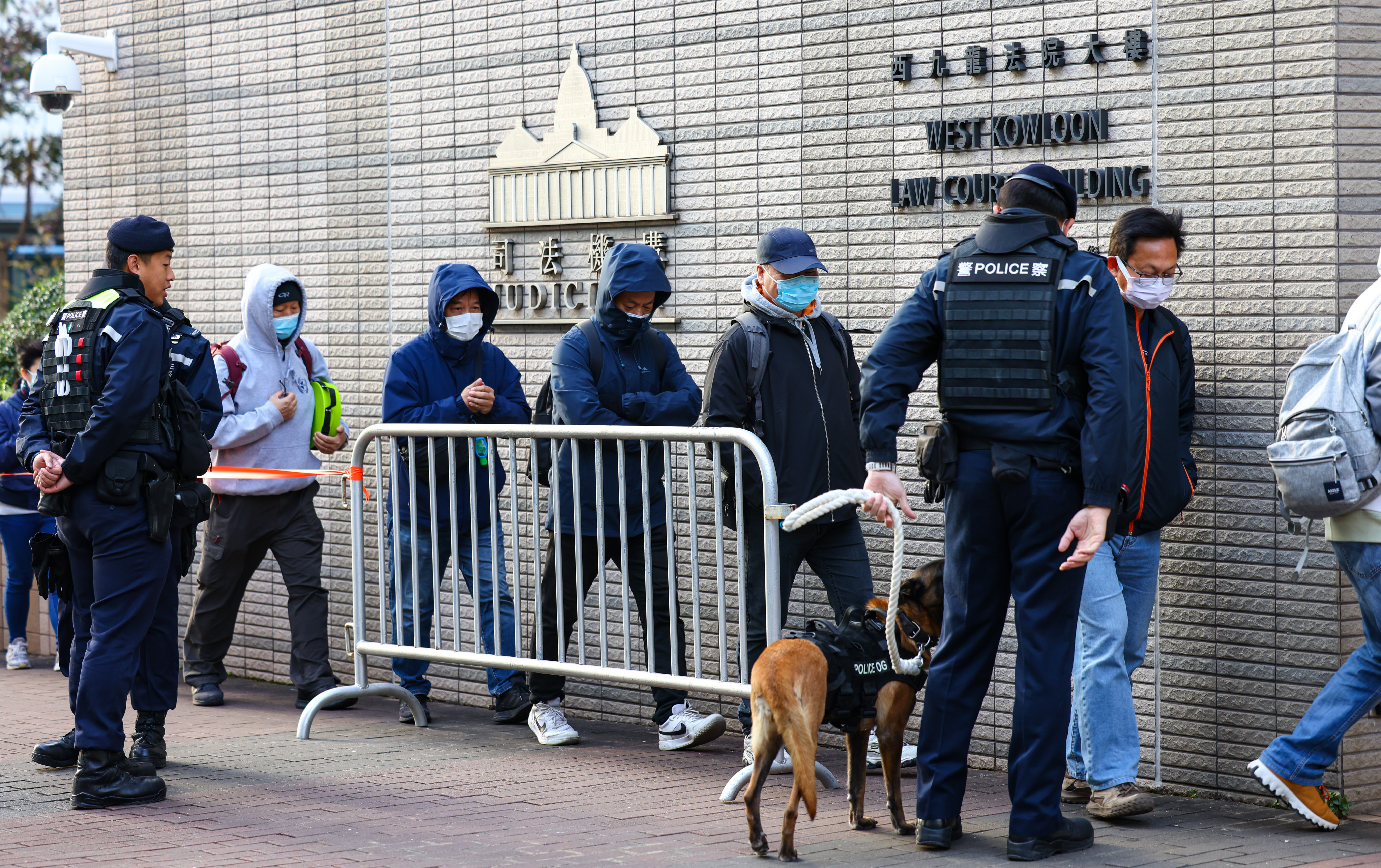 People queue for the trial of media tycoon Jimmy Lai at West Kowloon Court. Photo: Dickson Lee