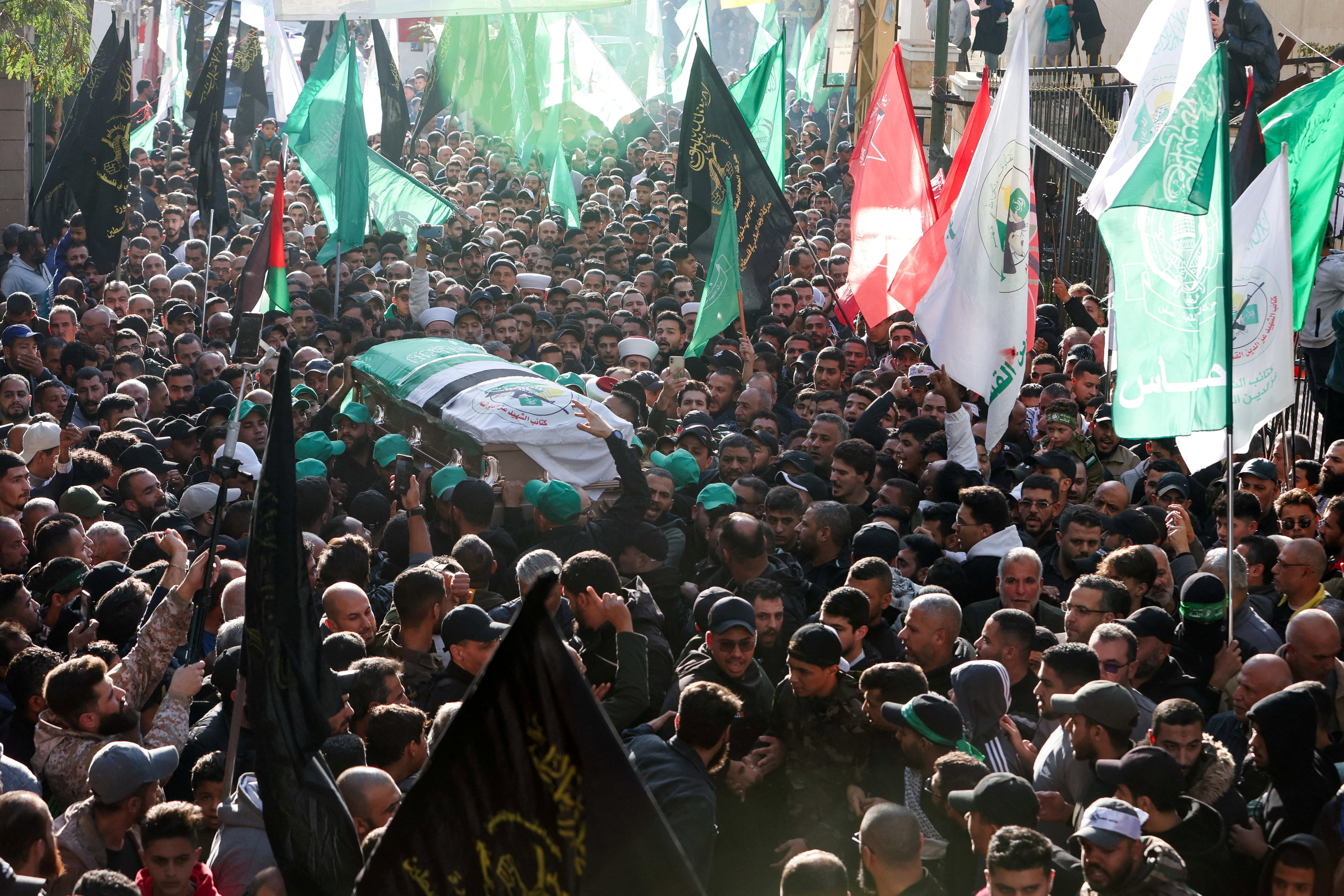 Mourners gather during the funeral of Ahmad Hammoud, who was killed along with Hamas deputy leader Saleh al-Arouri in what security sources said was an Israeli drone strike in Beirut on January 3, 2024. Photo: Reuters