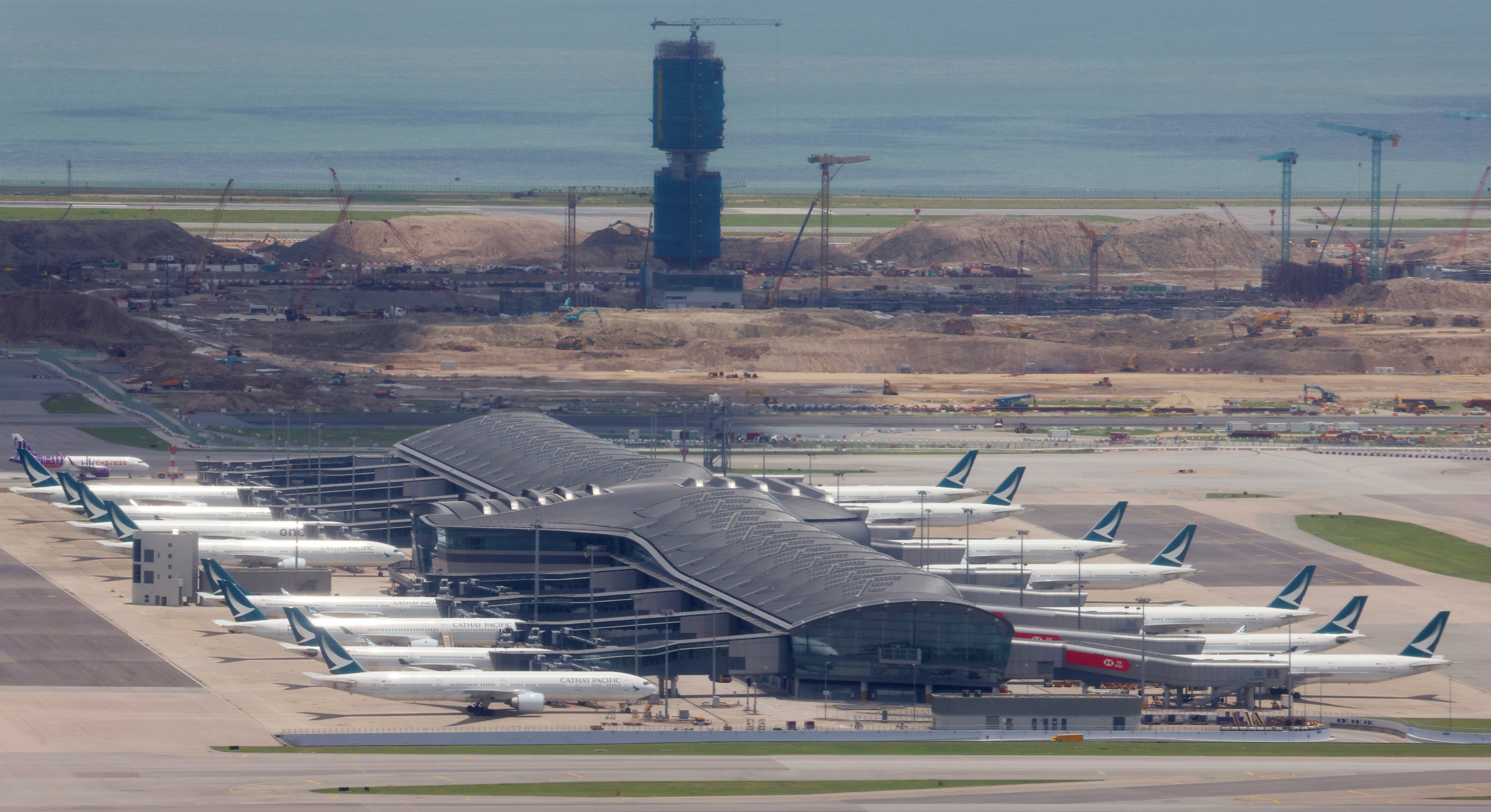 Construction work proceeds at Hong Kong International Airport in this picture from July 2023. Photo: Jelly Tse