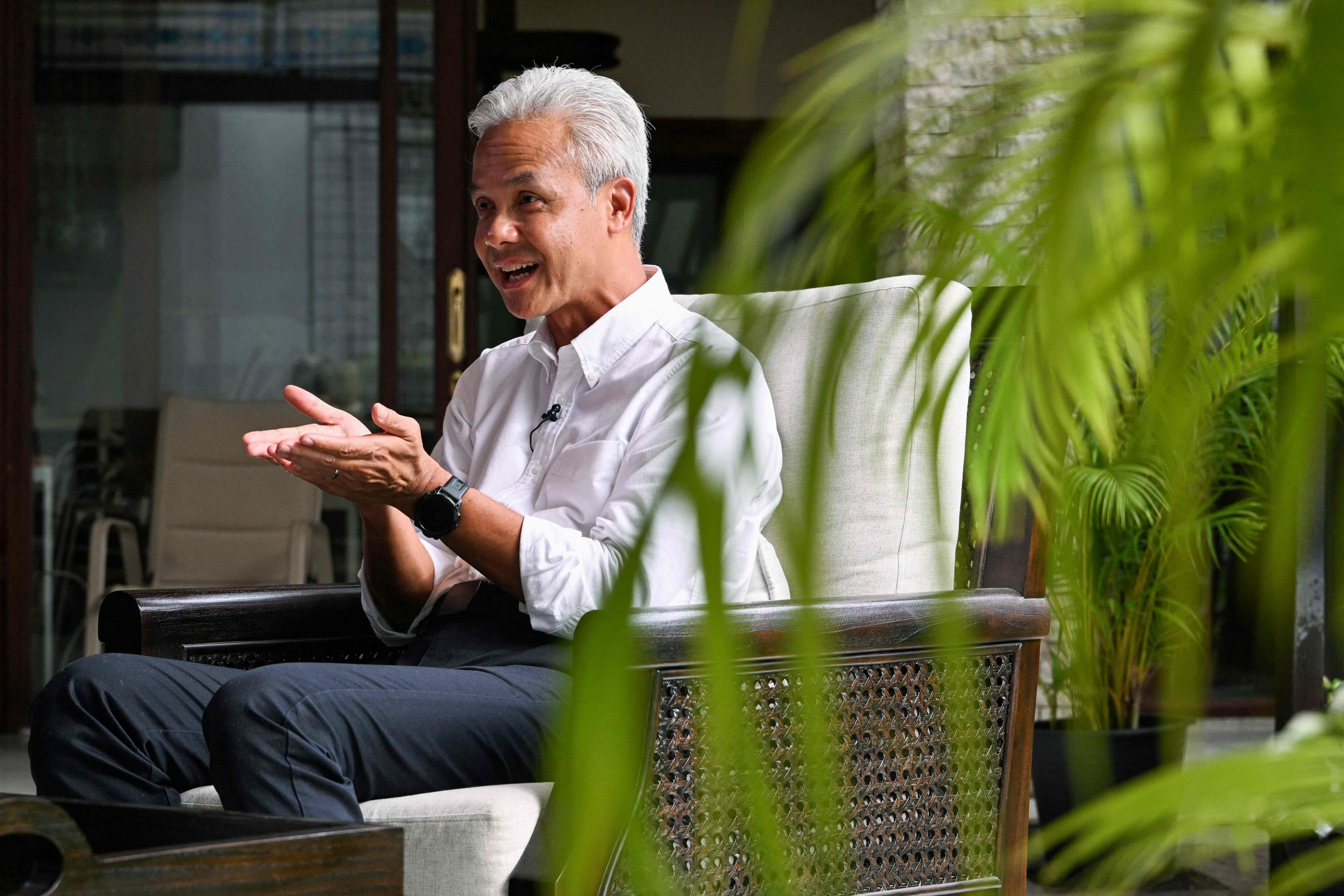 Indonesia’s presidential candidate and former Central Java governor Ganjar Pranowo gestures during an interview in Jakarta. He will face defence minister and frontrunner Prabowo Subianto and former Jakarta governor Anies Baswedan next month. Photo: AFP