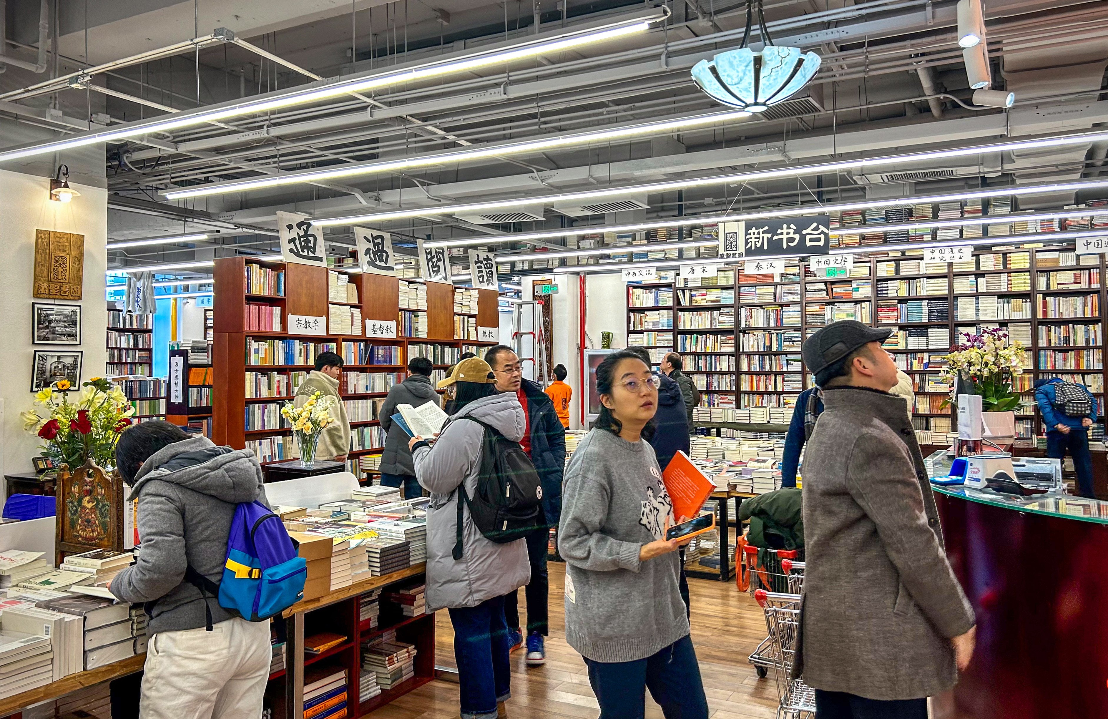 The interior view of All Sages Bookstore in Beijing. The historic store, which has recently moved, is “a barometer of Chinese society”, says owner Liu Suli.  Photo: Yuanyue Dang