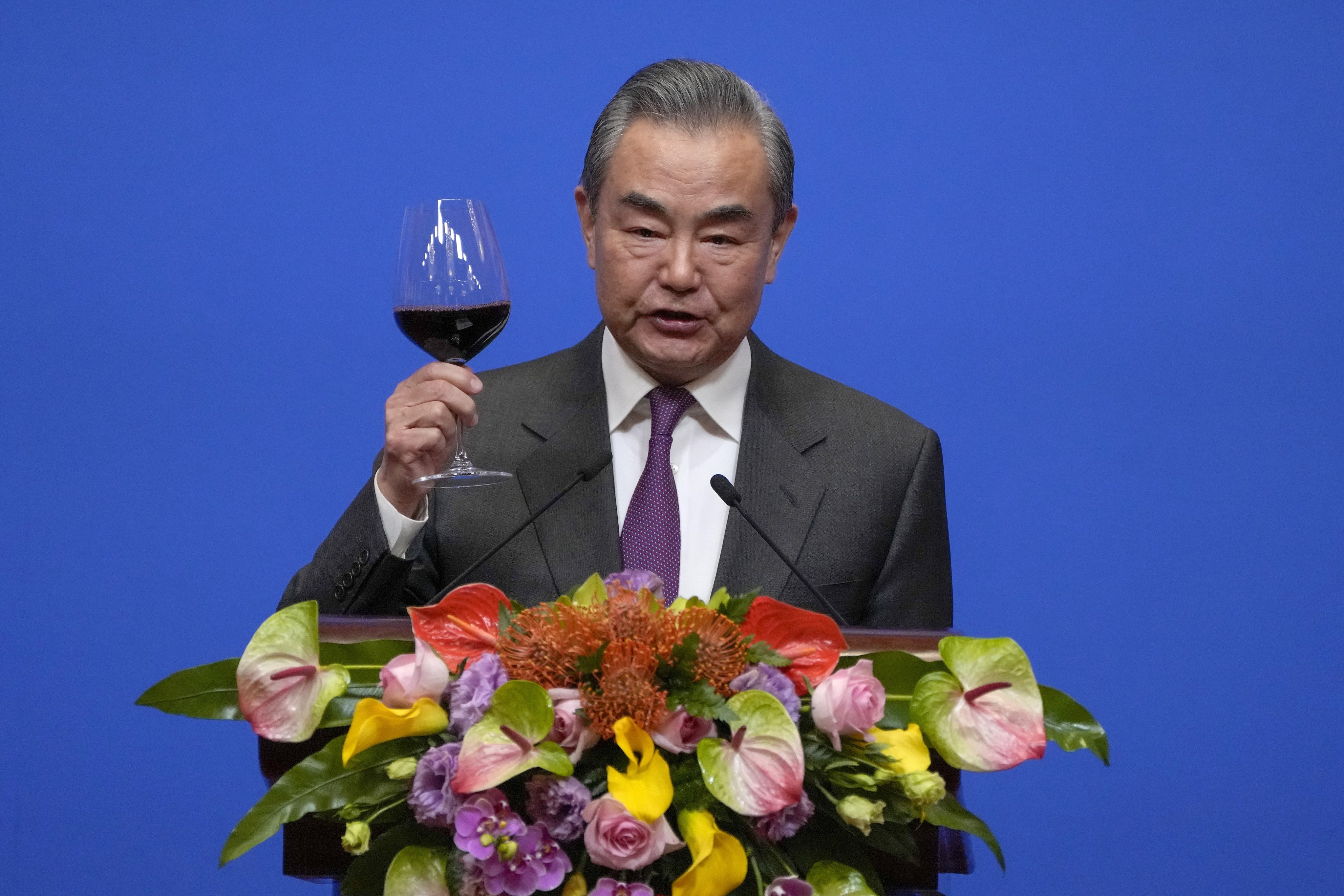 Chinese Foreign Minister Wang Yi gives a toast at a reception commemorating the 45th anniversary of China-US diplomatic ties in Beijing on Friday. Photo: EPA-EFE