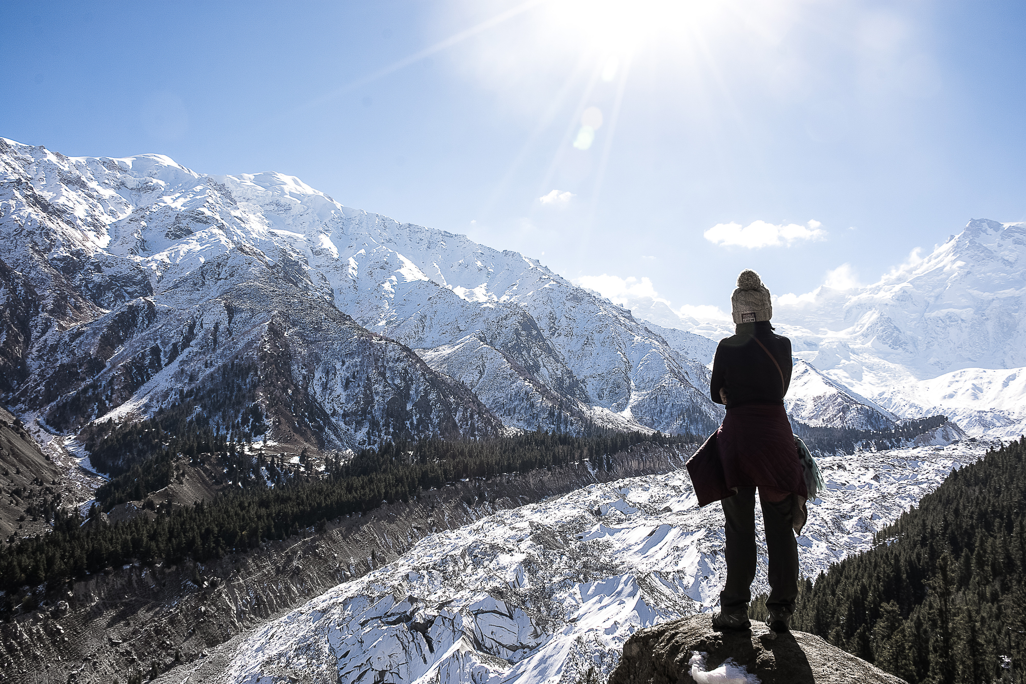 A hiker stops to take in the view of Nangar Parbat. Photo: Shutterstock Images