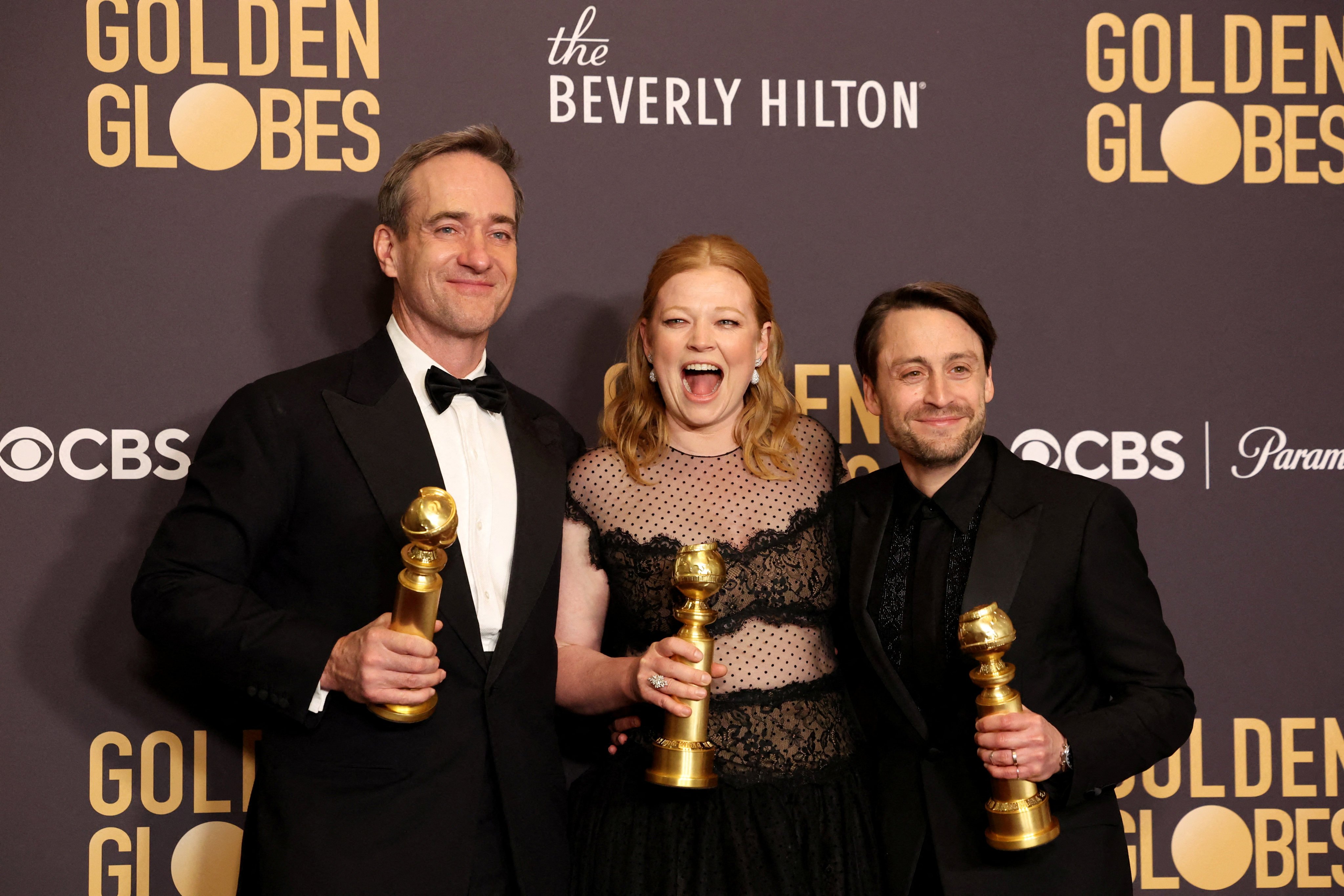 Sarah Snook,  Matthew Macfadyen, and Kieran Culkin pose with their Golden Globes for best actor and actress and best supporting actor in a TV drama series for “Succession”, which also won best drama. Photo: Reuters