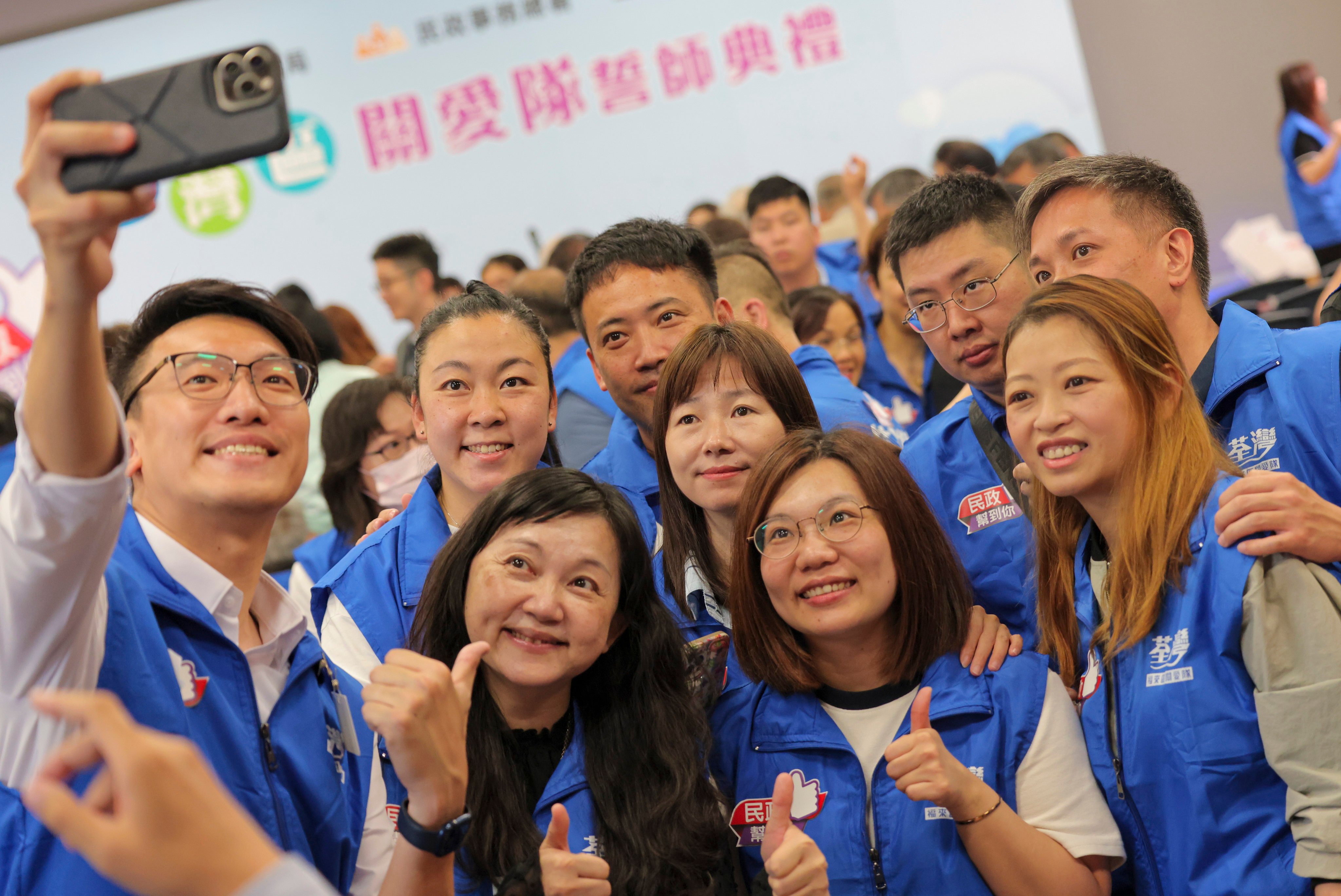 Community care teams in Tsuen Wan join a pledging ceremony held by the government last May. Photo: Jelly Tse