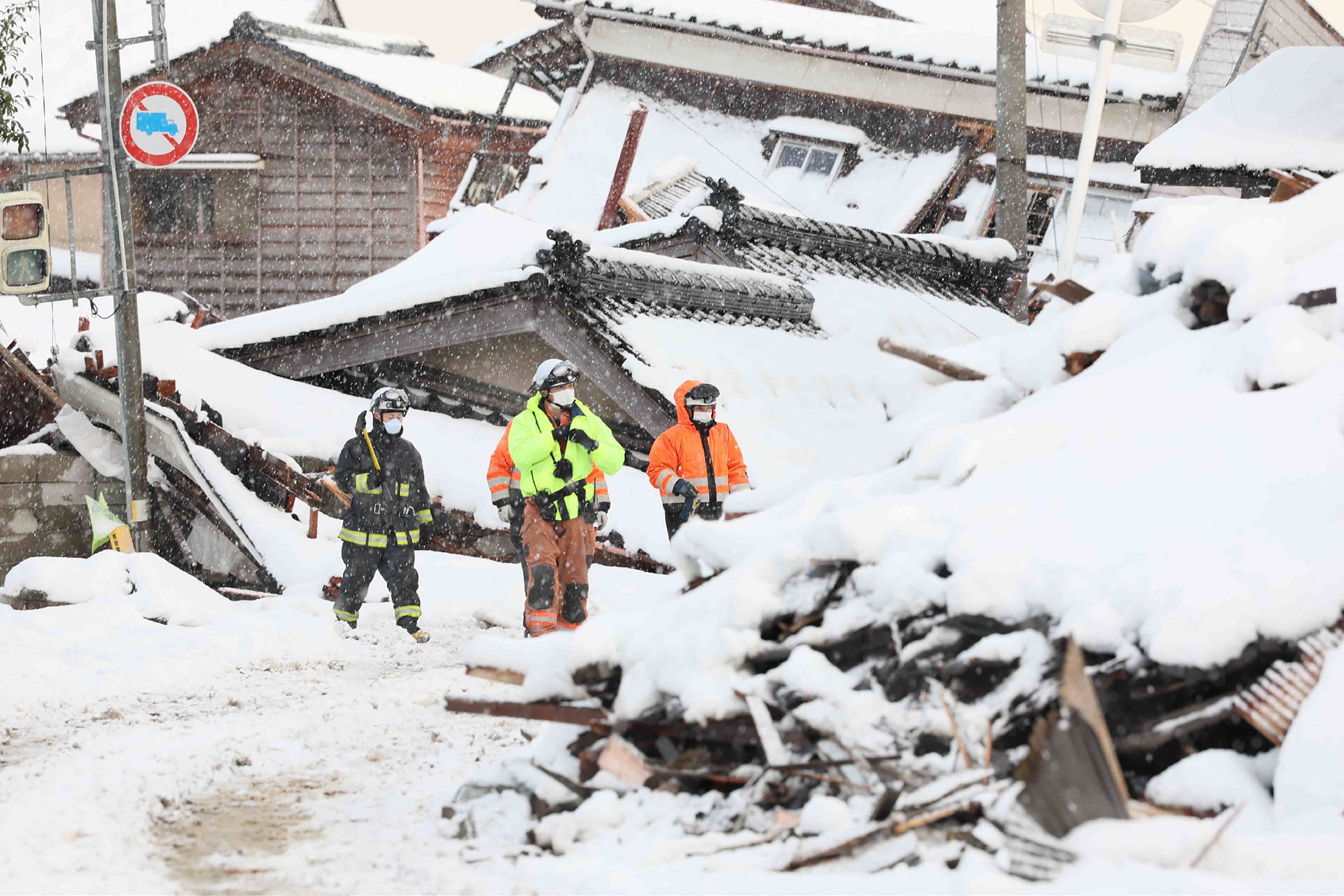 Firefighters search for missing people as snow blankets parts of the disaster-hit area in the city of Suzu, Ishikawa prefecture, a week after a major earthquake struck the Noto region in Ishikawa prefecture on New Year’s Day. Photo: Jiji Press/AFP