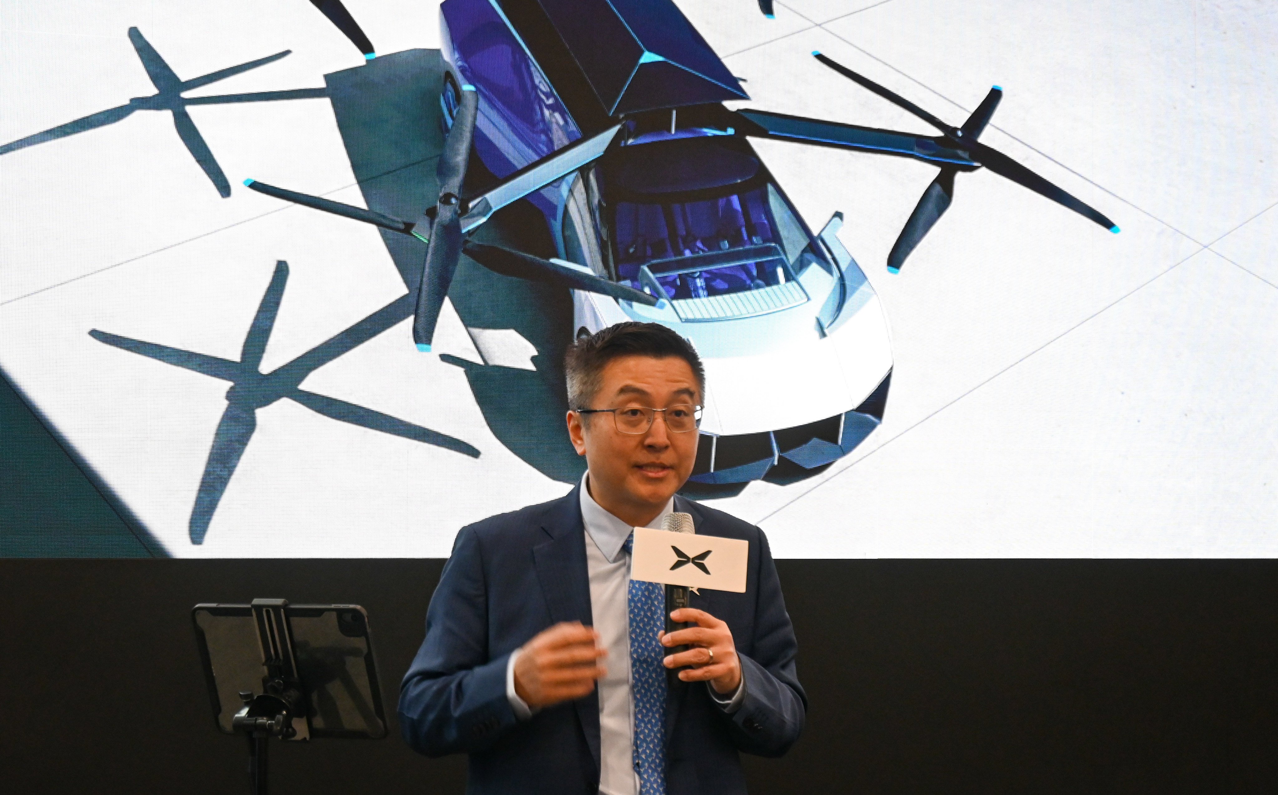 Brian Gu Hongdi, vice-chairman and president of Xpeng, discusses the company’s new flying car at CES on January 9, 2024. Photo: Matt Haldane