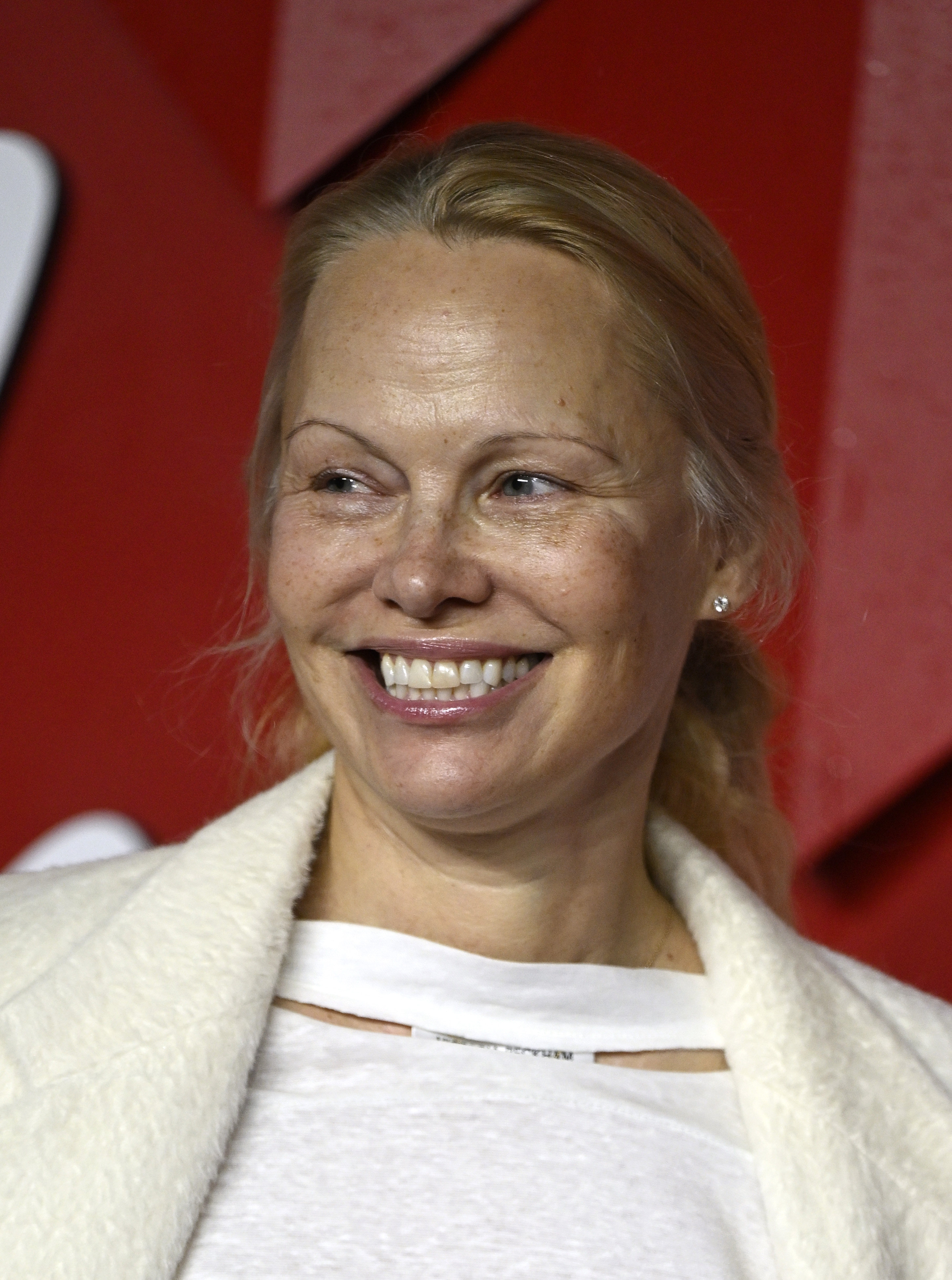 Pamela Anderson attends The Fashion Awards 2023 at the Royal Albert Hall in London, England on December 4, 2023.  Her no-make-up look has impressed the general public and other celebrities alike at a time when Gen Z anti-ageing videos on TikTok are going viral. Photo: Getty Images