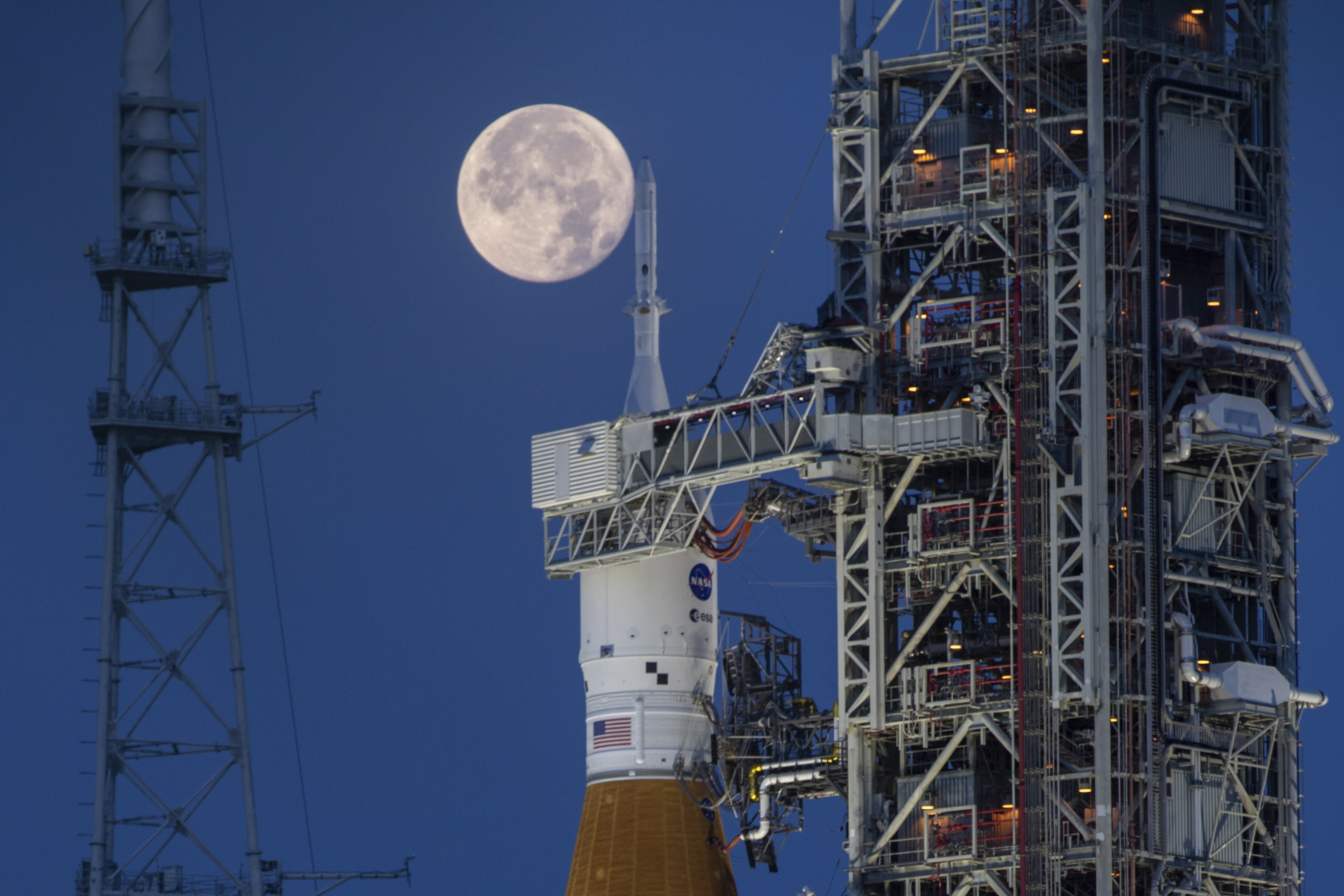 A full moon is seen behind the Artemis I Space Launch System and Orion spacecraft at Nasa’s Kennedy Space Centre in Florida in June 2022. Photo: Nasa via AP