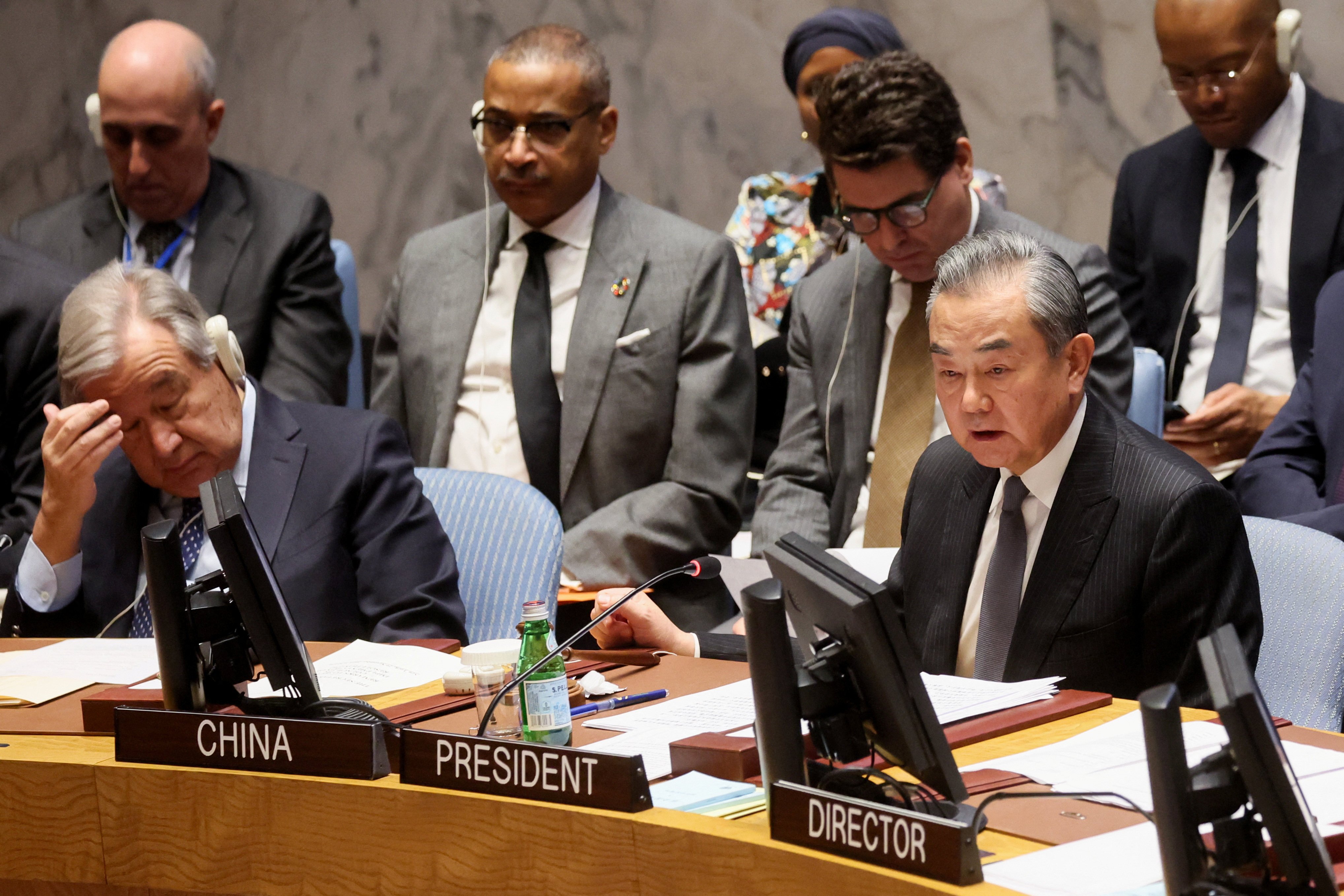 Chinese Foreign Minister Wang Yi (right) and United Nations Secretary General Antonio Guterres attend a UN Security Council meeting on the conflict between Israel and Hamas in New York on November 29, 2023. Photo: Reuters
