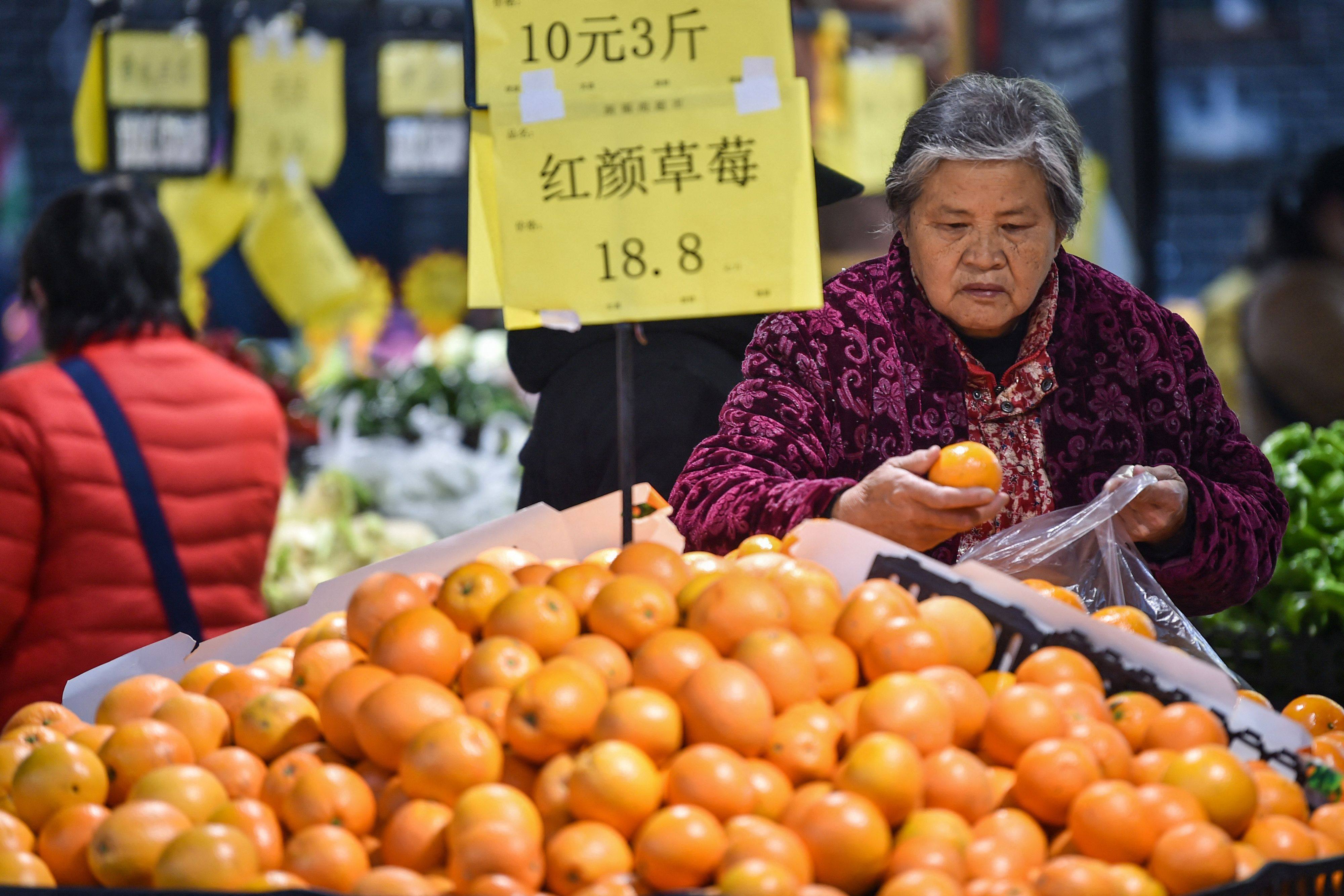 China’s consumer price index (CPI) fell by 0.3 per cent year on year in December, the National Bureau of Statistics said on Friday. Photo: AFP