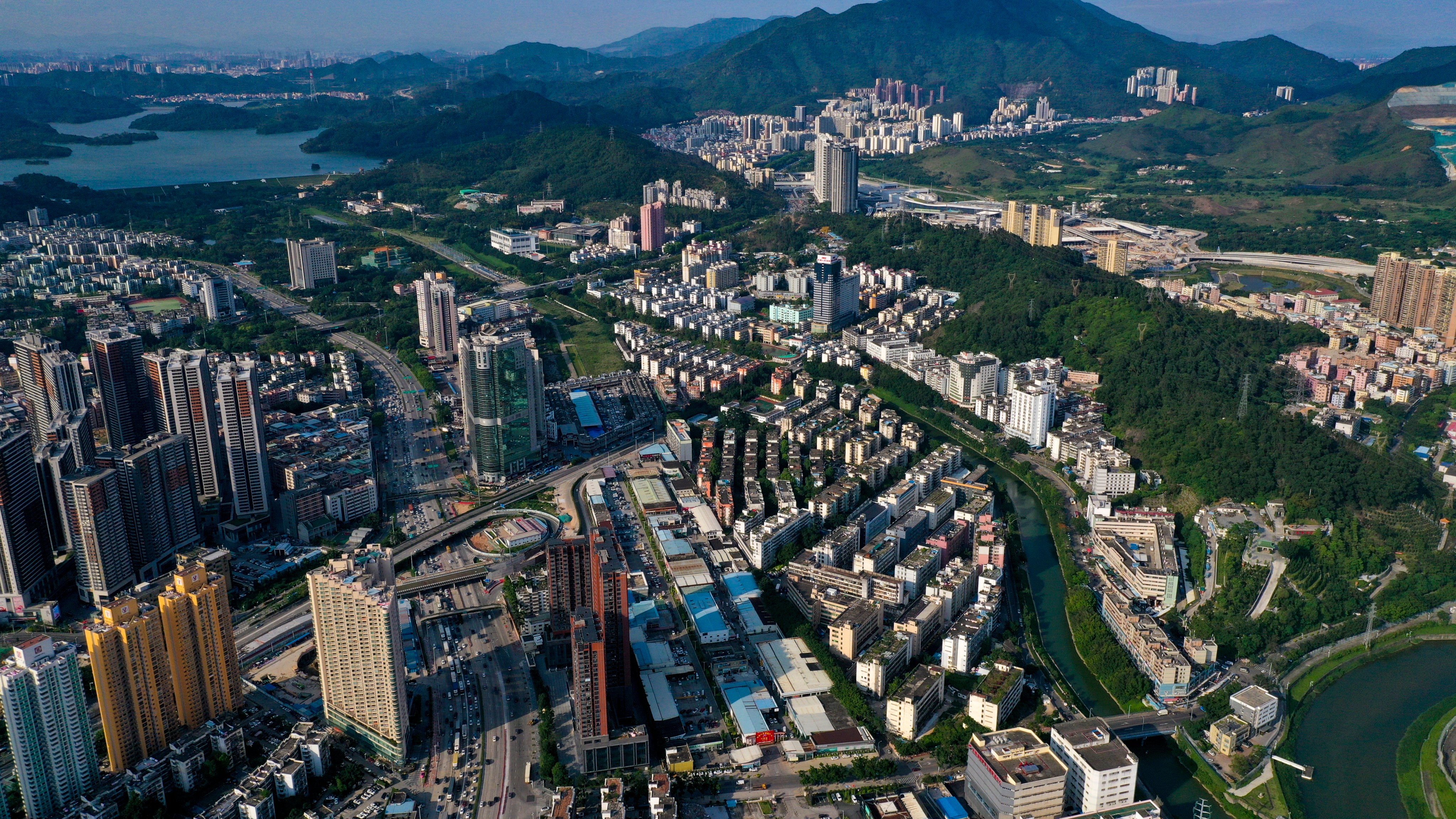 An aerial view of Shenzhen. A source said the return of a multiple-entry visa scheme for Shenzhen residents going to Hong Kong was among the proposals discussed at a high-level exchange in Guangzhou. Photo: Martin Chan