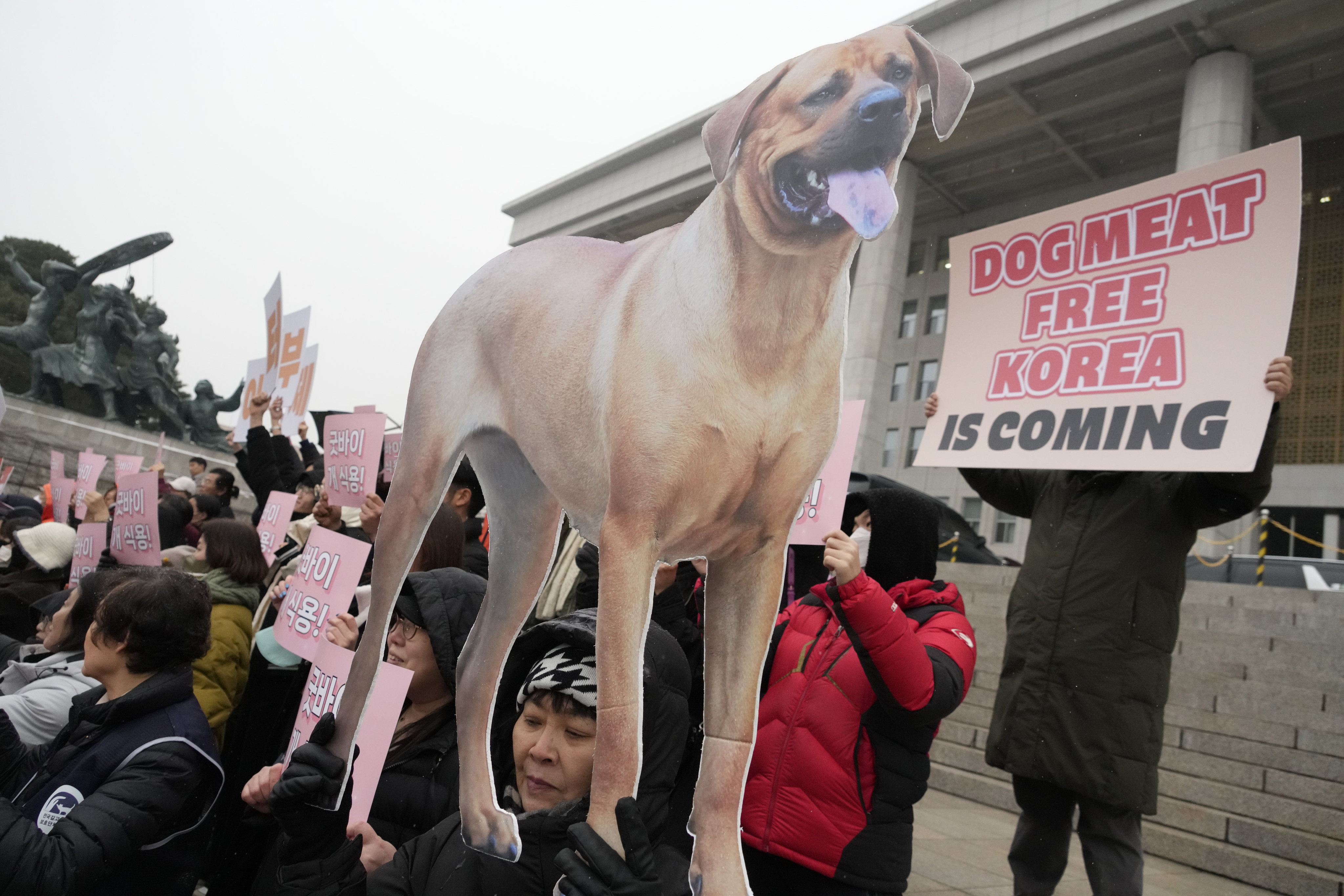 Animal rights activists attend a protest rally supporting the government’s bill to ban dog meat, at the National Assembly in Seoul on January 9. Photo: AP