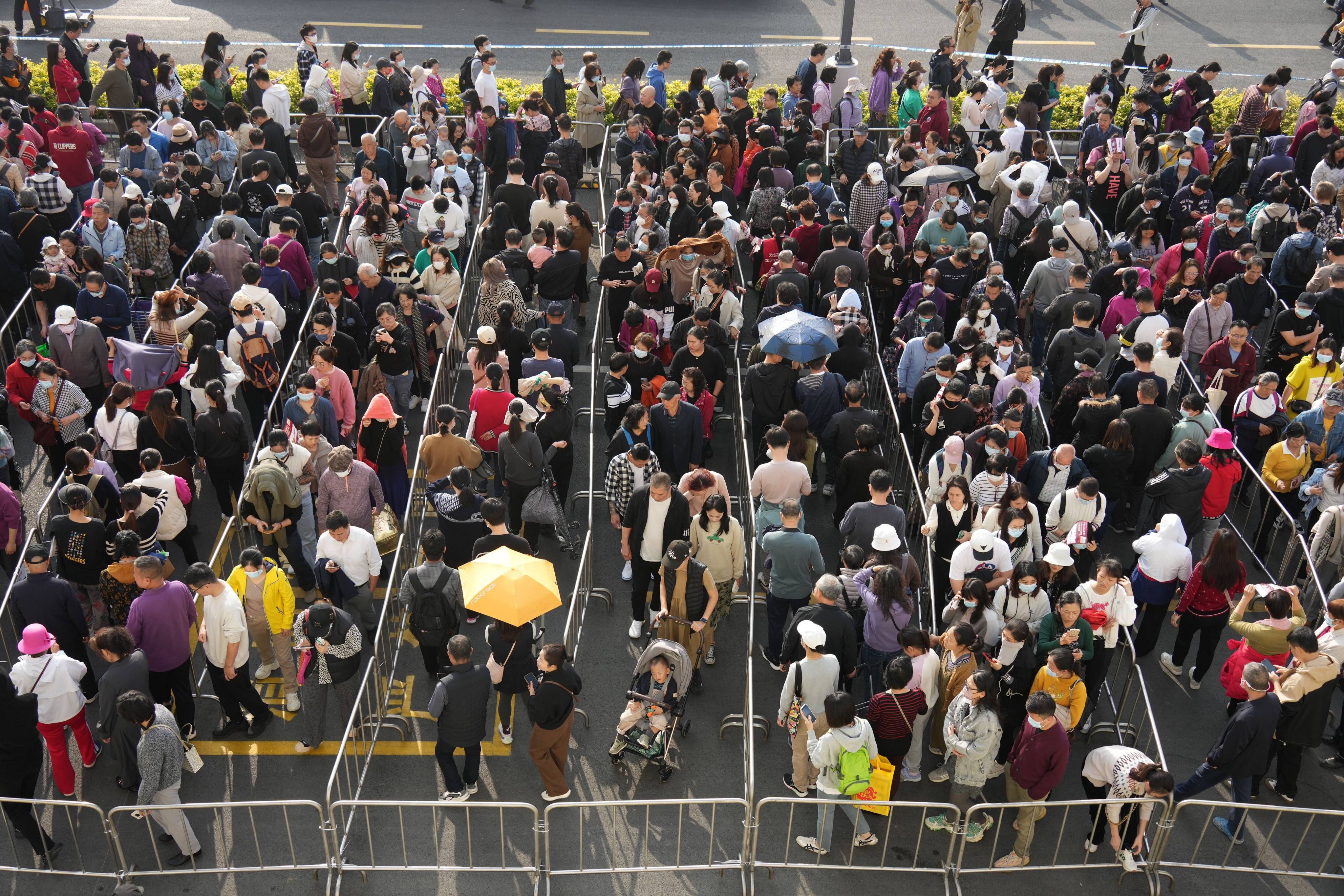 Thousands queue up outside the newly opened Costco in Shenzhen. Photo: Eugene Lee
