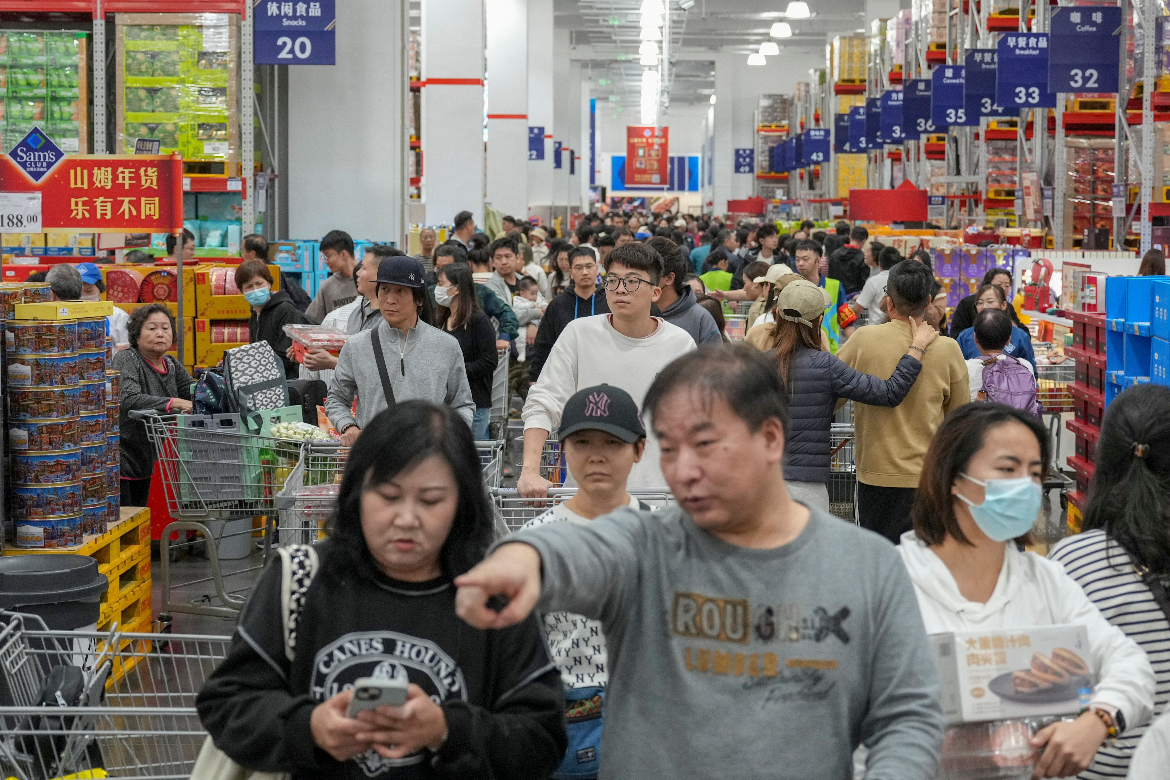 Shoppers from Hong Kong flock to a Sam’s Club store in Qianhai, Shenzhen. Hongkongers have been heading north to shop in mainland China megastores. Photo: Eugene Lee