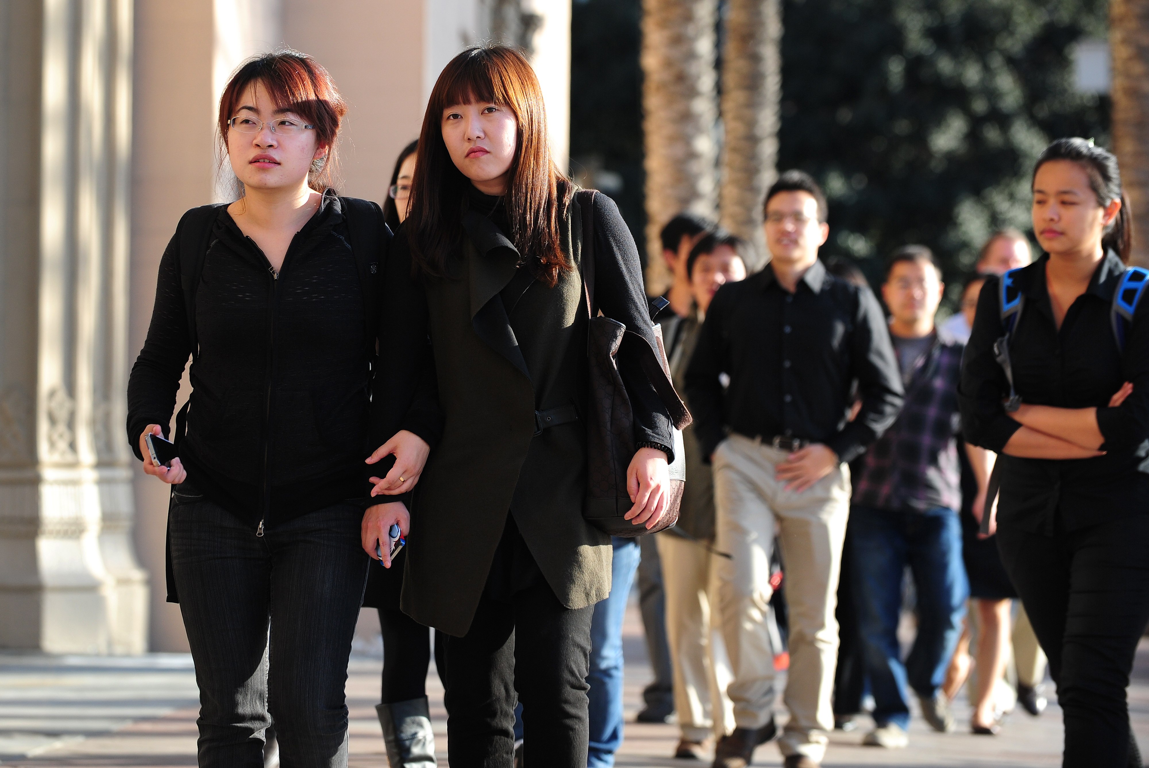 University of Southern California students head to a memorial service on April 18, 2012, in Los Angeles, for two Chinese graduate students shot to death near the campus. Photo: AFP 