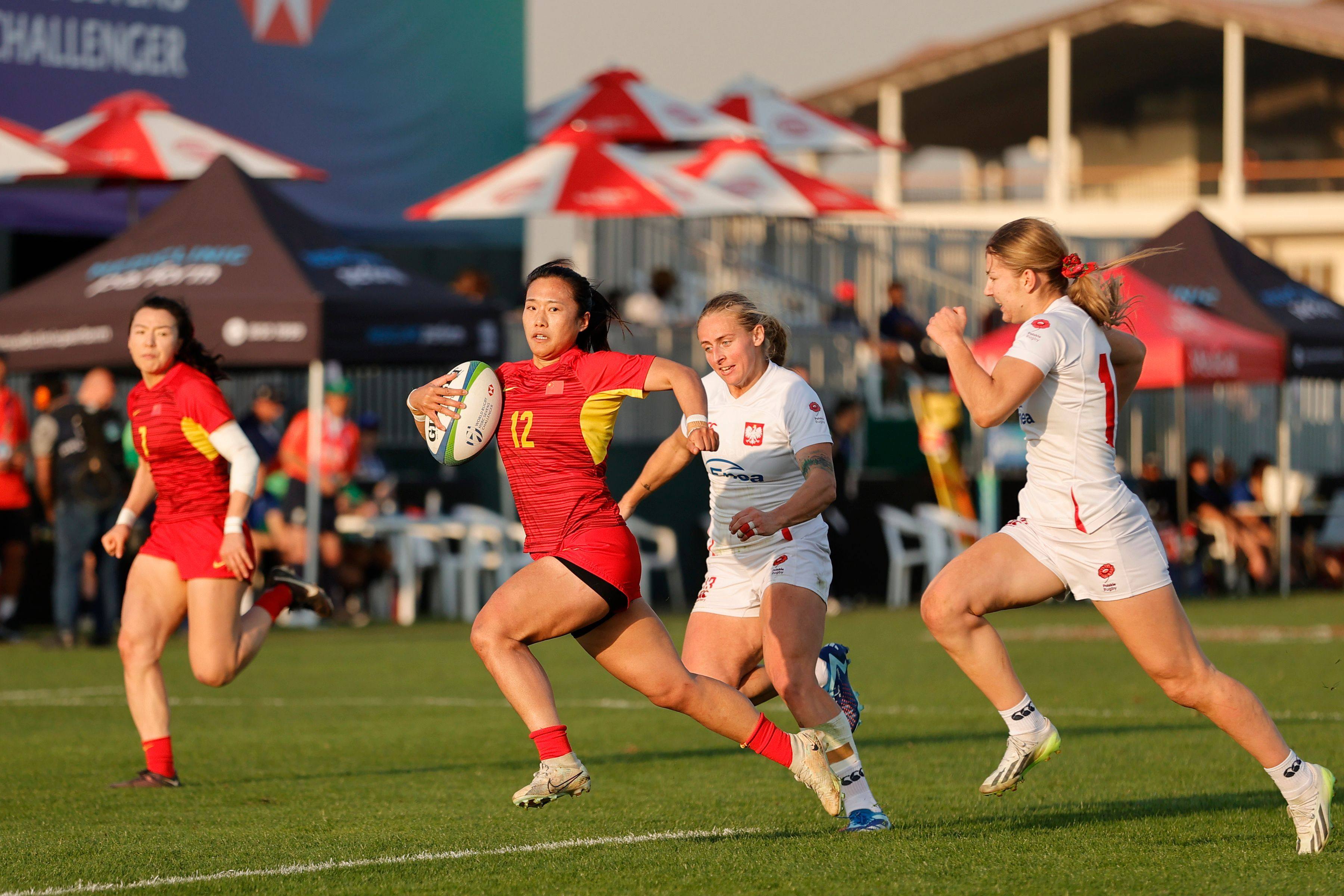China’s YuHu cuts through the Poland defence during her side’s triumphant World Rugby Sevens Challenger Series tournament in Dubai. Photo: World Rugby
