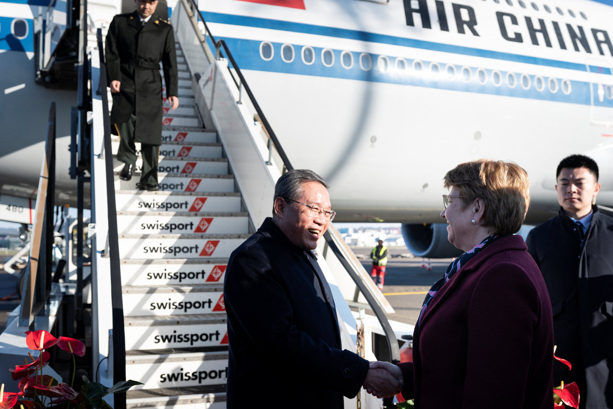 Premier Li Qiang is received by President Viola Amherd upon arrival in Switzerland. Photo: Pool via Reuters