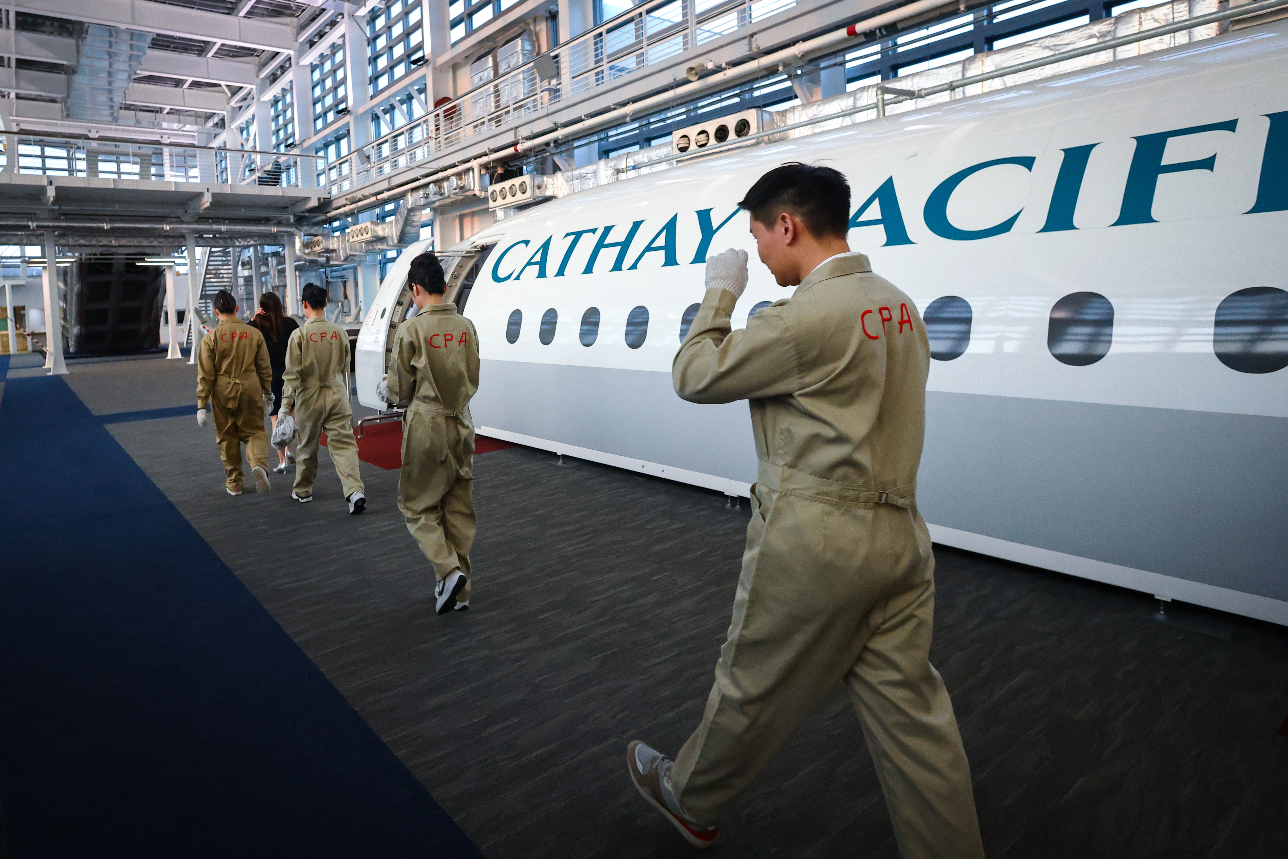 Cathay Pacific cabin crew recruits who recently completed their training. The airline says it aims to hire 1,500 people from mainland China by 2025. Photo: Dickson Lee