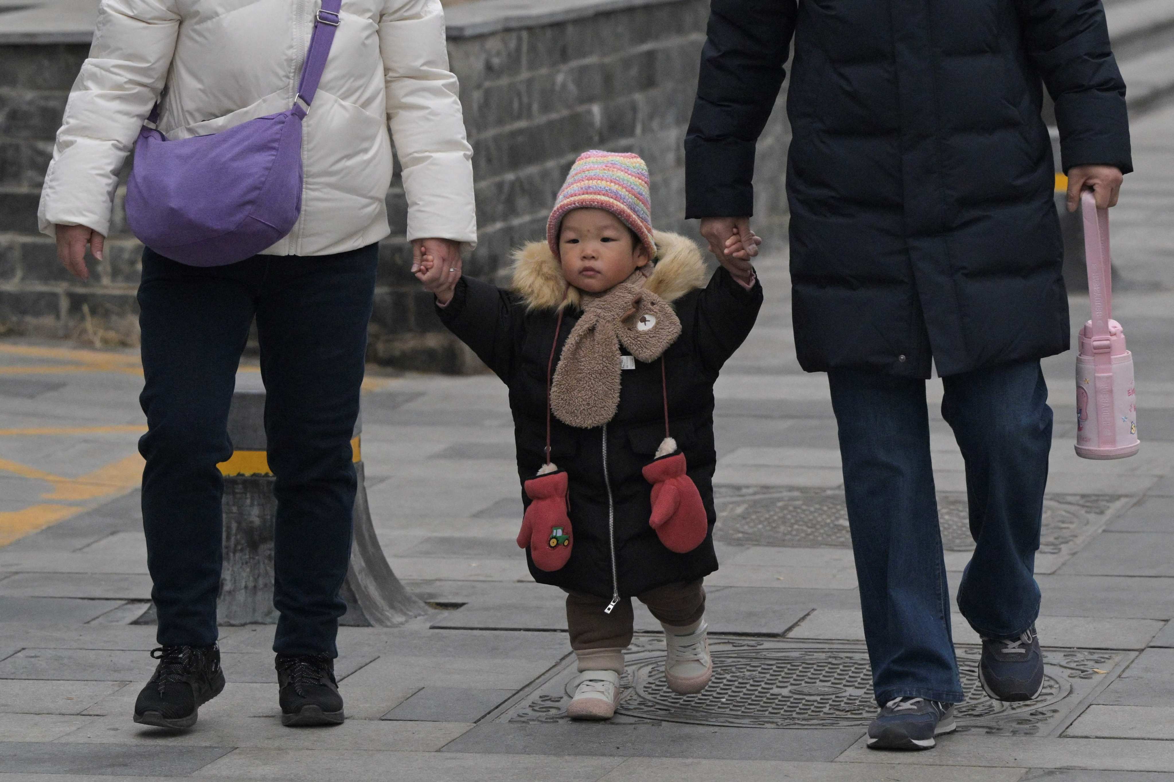 China’s overall population fell by 2.08 million last year to 1.4097 billion. Photo: AFP