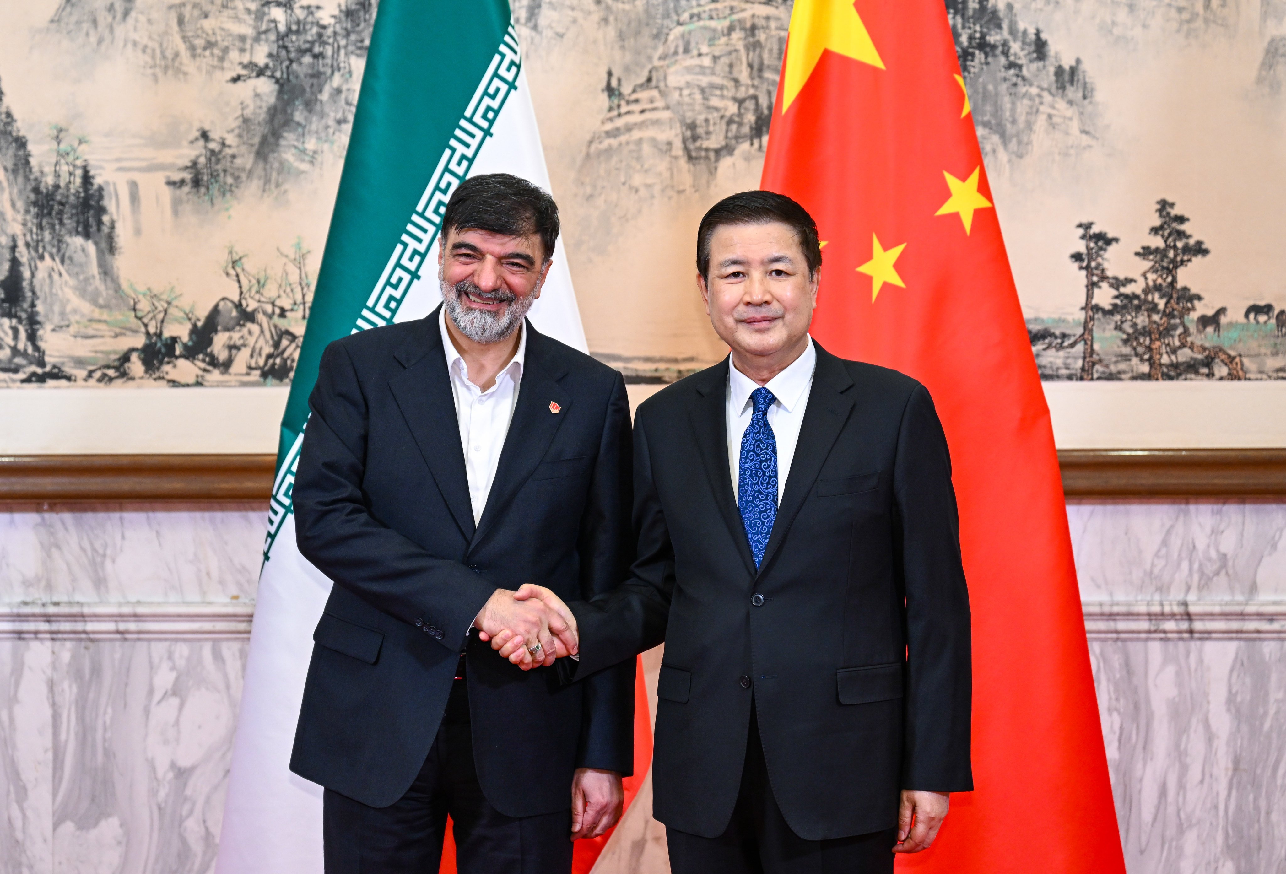 Iranian Police Chief Ahmad Reza Radan (left) and Wang Xiaohong, China’s public security minister, in Beijing on Tuesday. Photo: Xinhua