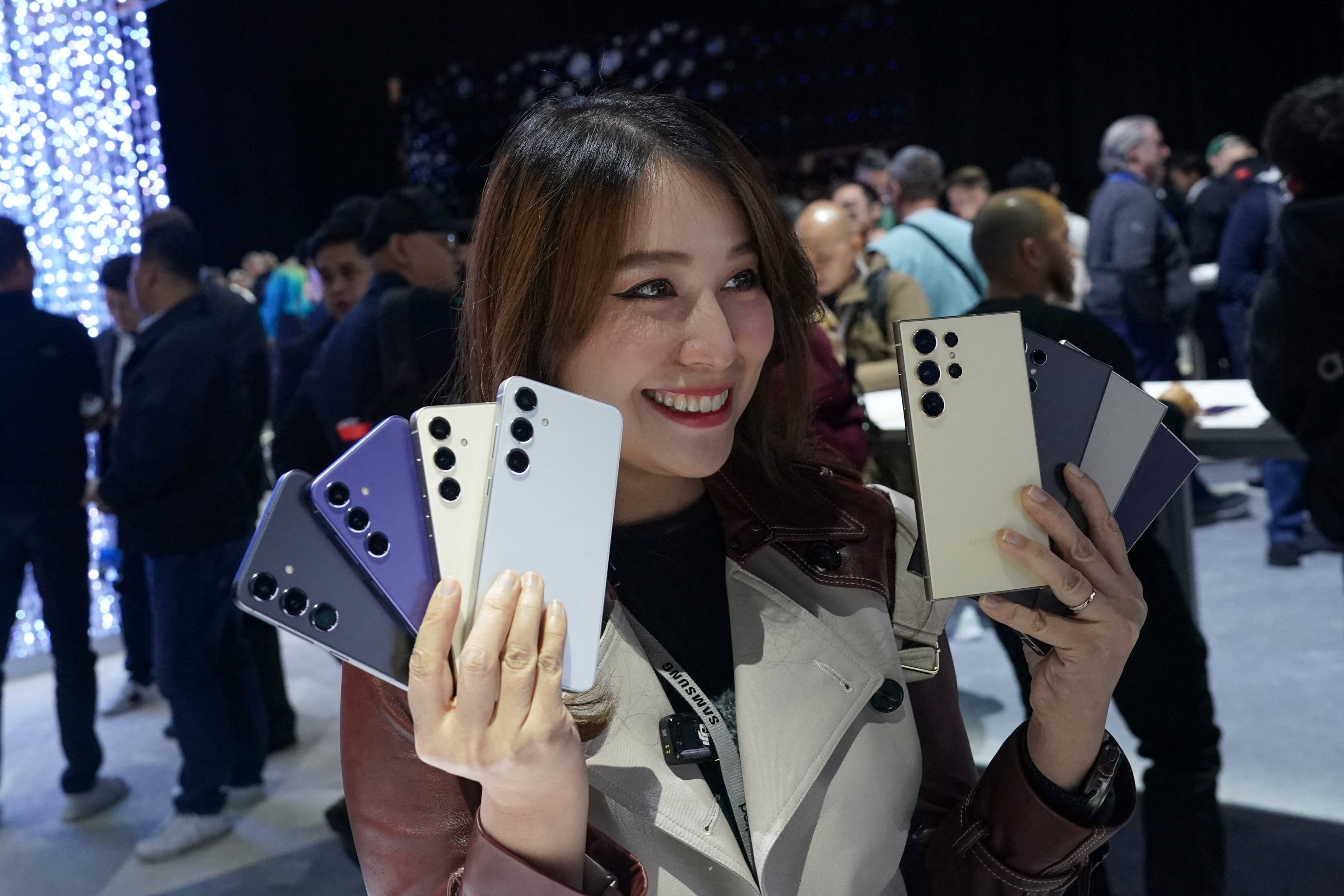 An influencer poses with Samsung’s new phones at the Galaxy Unpacked event in San Jose, California. Photo: Reuters