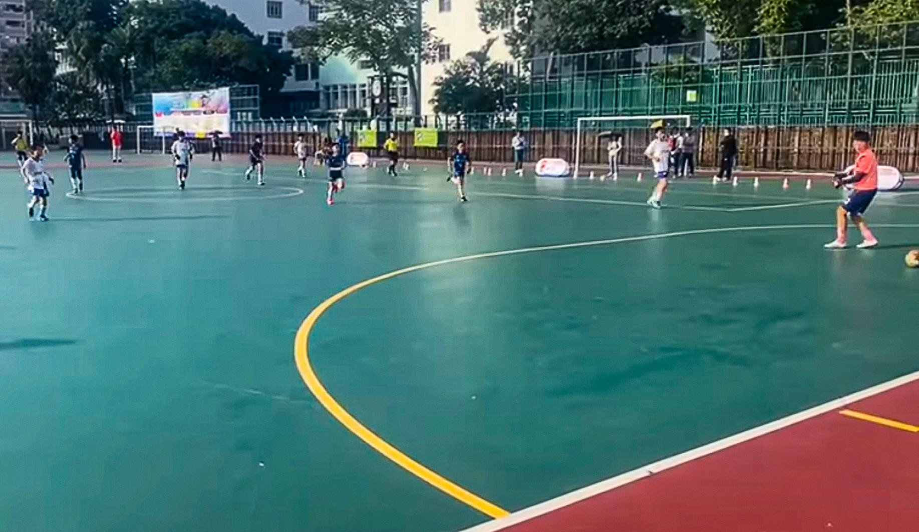 A screen grab from a video shows the ball rolling past the goalkeeper during the game between Kwai Chung district and Tuen Mun district. Photo: Handout