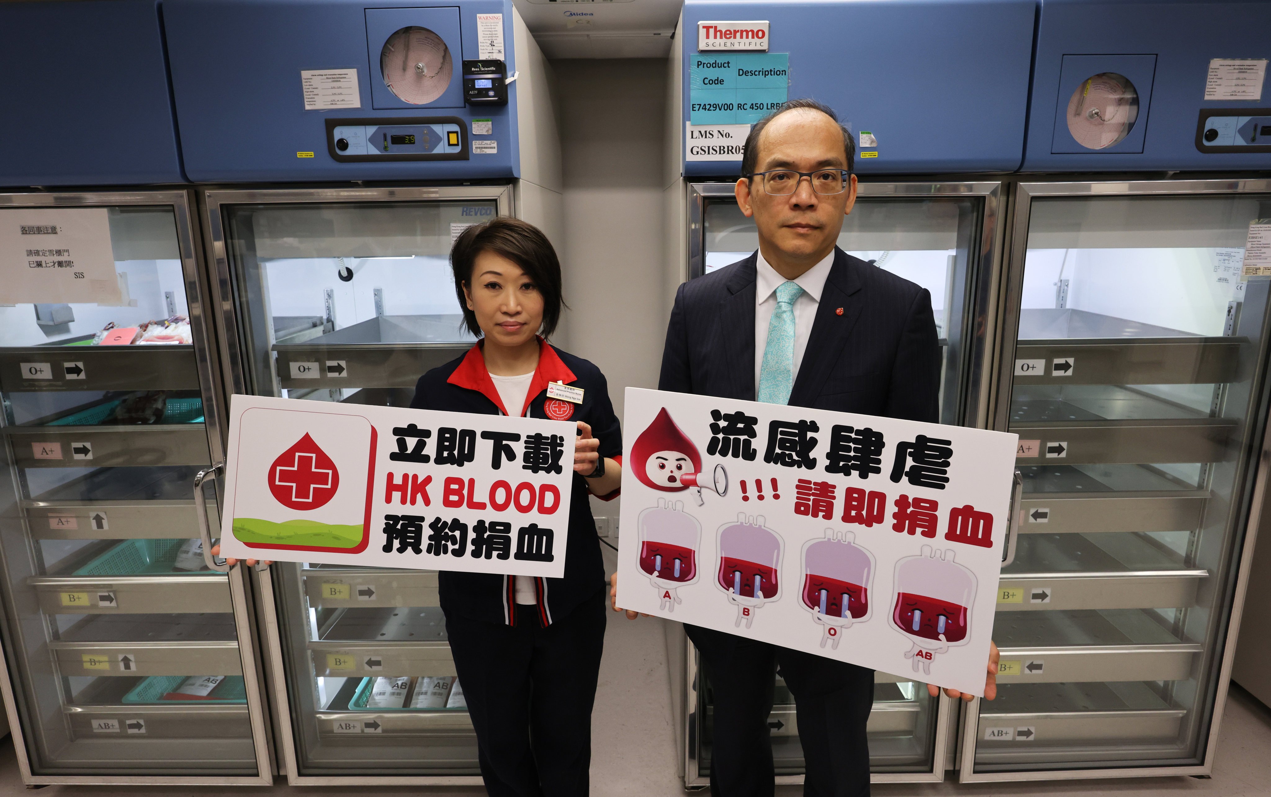Lee Cheuk-kwong (right), the chief executive and medical director of Hong Kong Red Cross Blood Transfusion Service, says the number of regular donors has declined in recent weeks due to flu-related illnesses. Photo: May Tse