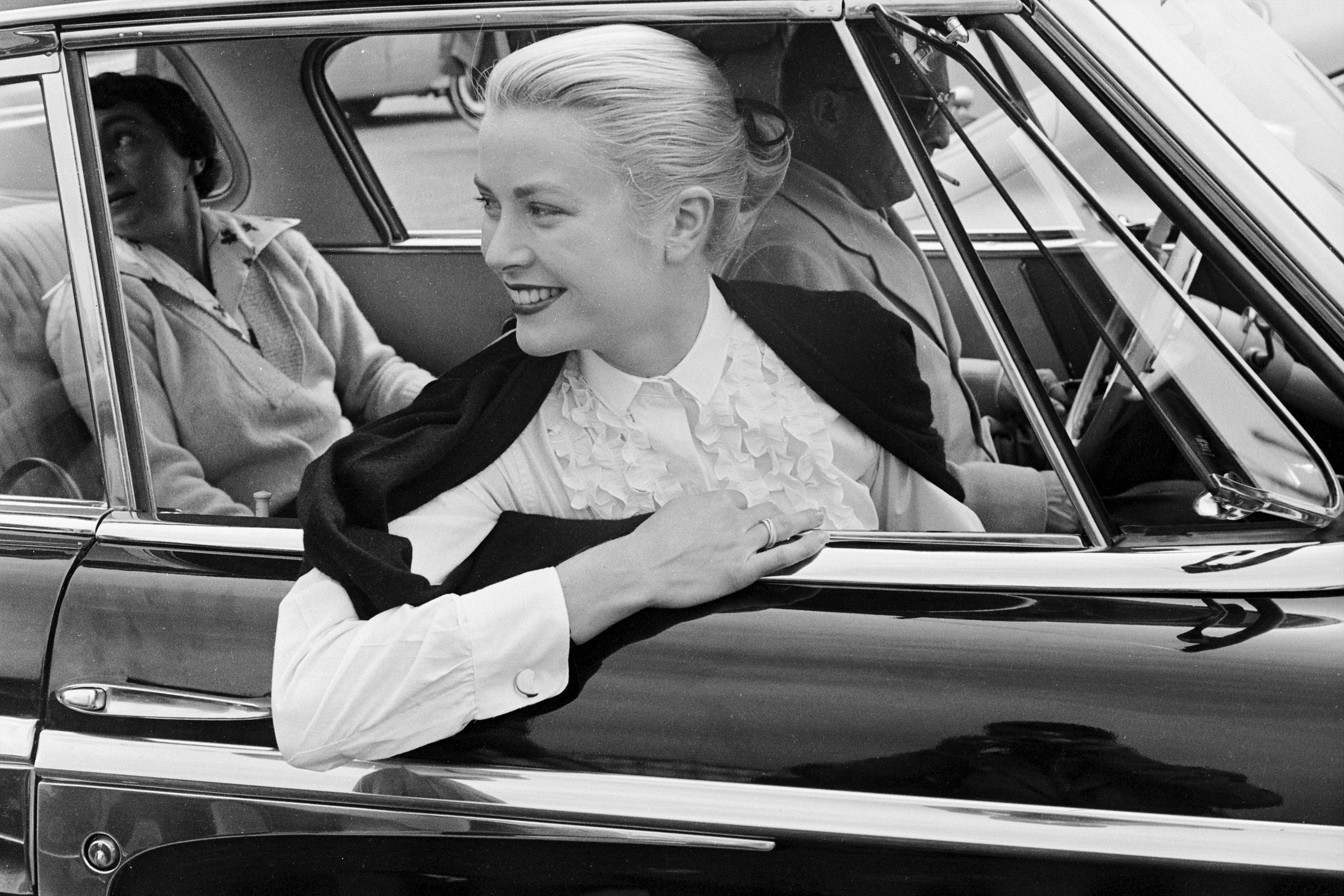 Grace Kelly wearing a Trinity ring at the Cannes festival, 1955. Photo: Handout